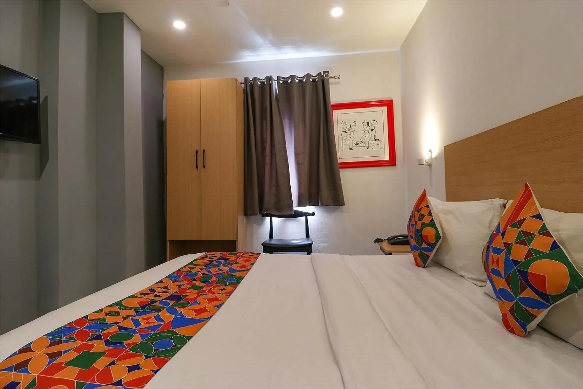 Bed in FabHotel La Serene Punjabi Bagh