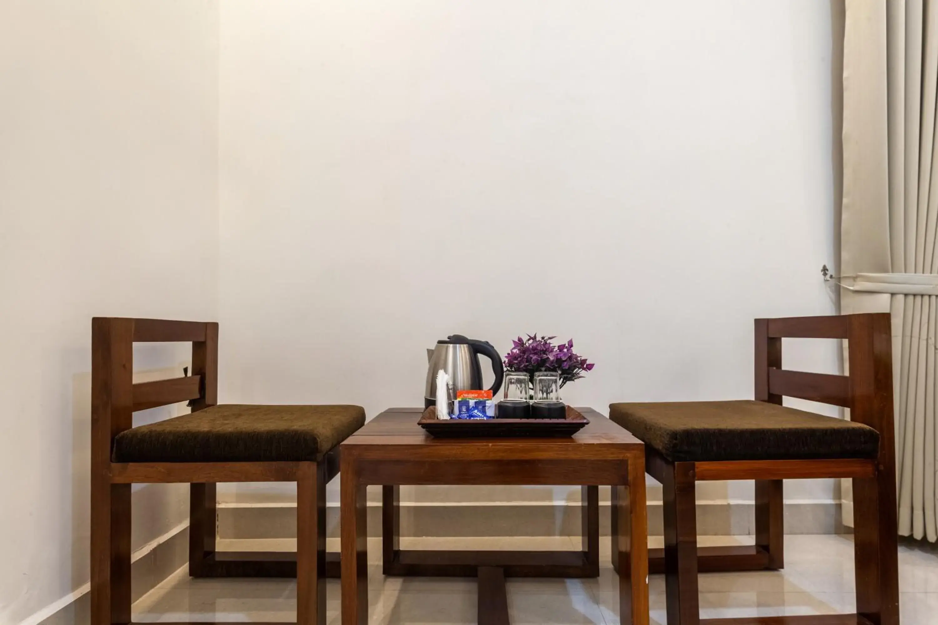 Bedroom in Treebo Sans Sarav Kushalnagar Bedroom in Treebo Sans Sarav Kushalnagar