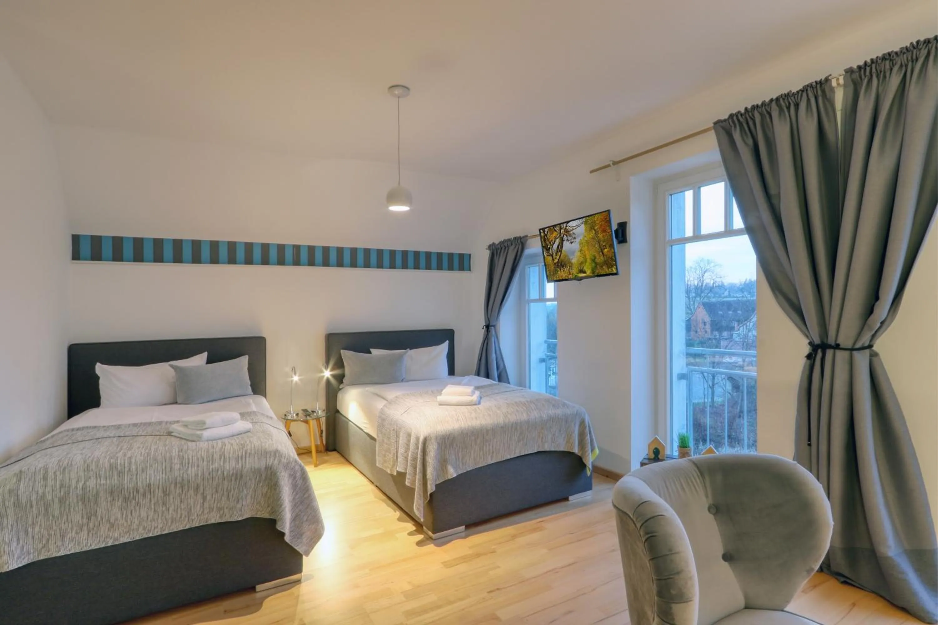 Bed in Harz-Urlaubs-Alm Hotel & Ferienhäuser