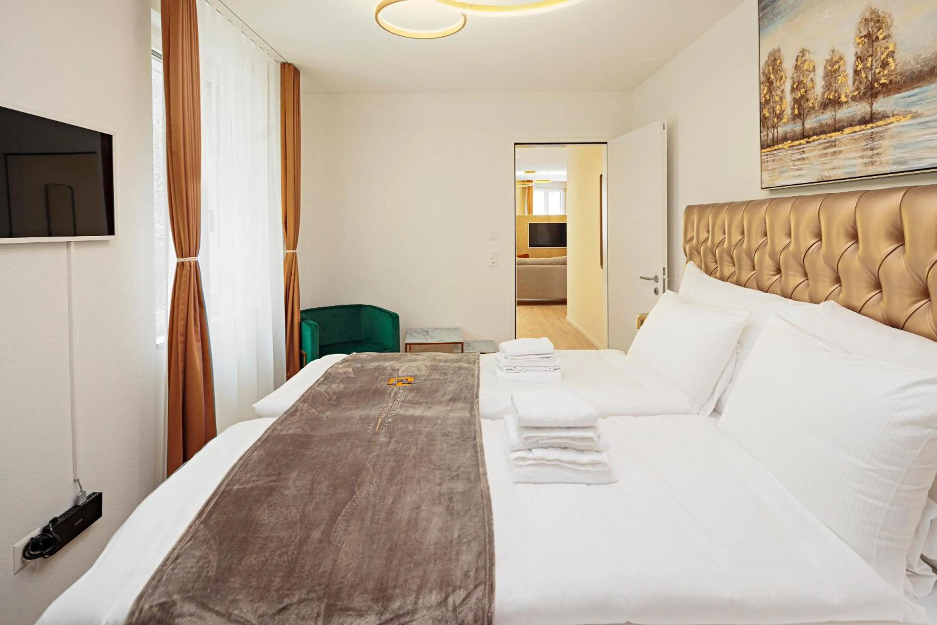 Bed in VISIMO Apartments Mühlensteg St Gallen - Elegant Quiet Central