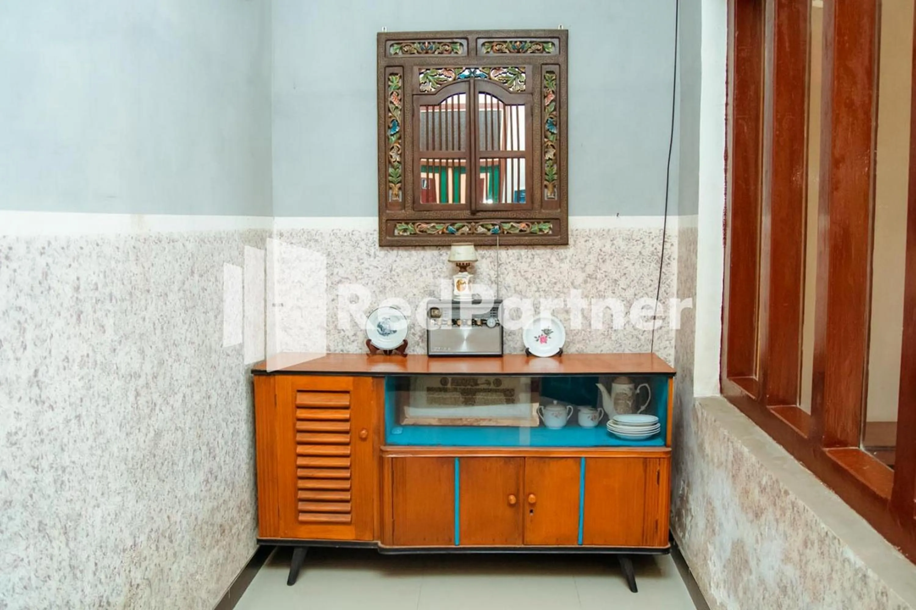 Bedroom in Flamboyan Asri Syariah Mitra RedDoorz near Kampung Inggris Pare