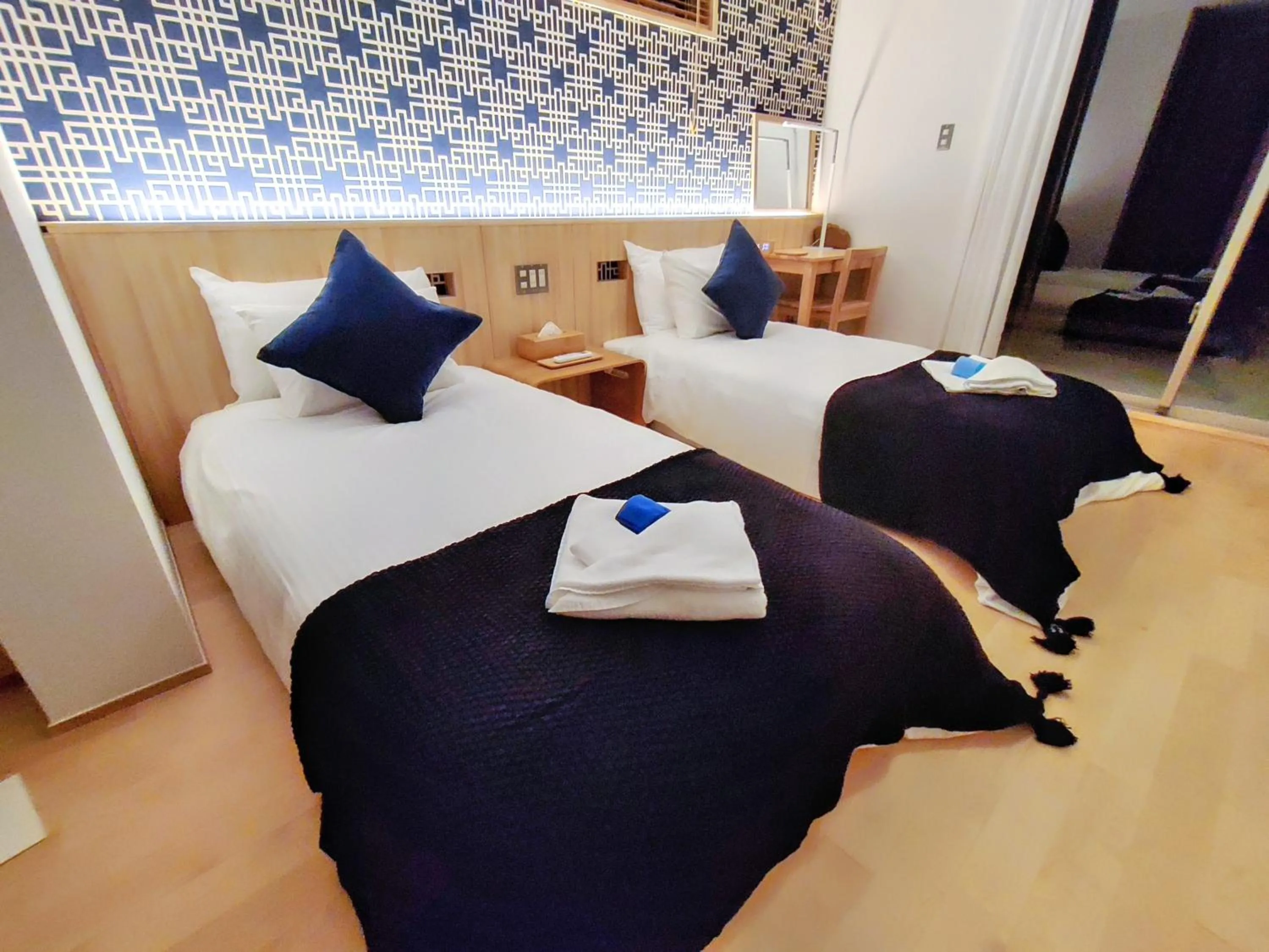 Bed in Ocean View Ishigaki Sora and Umi