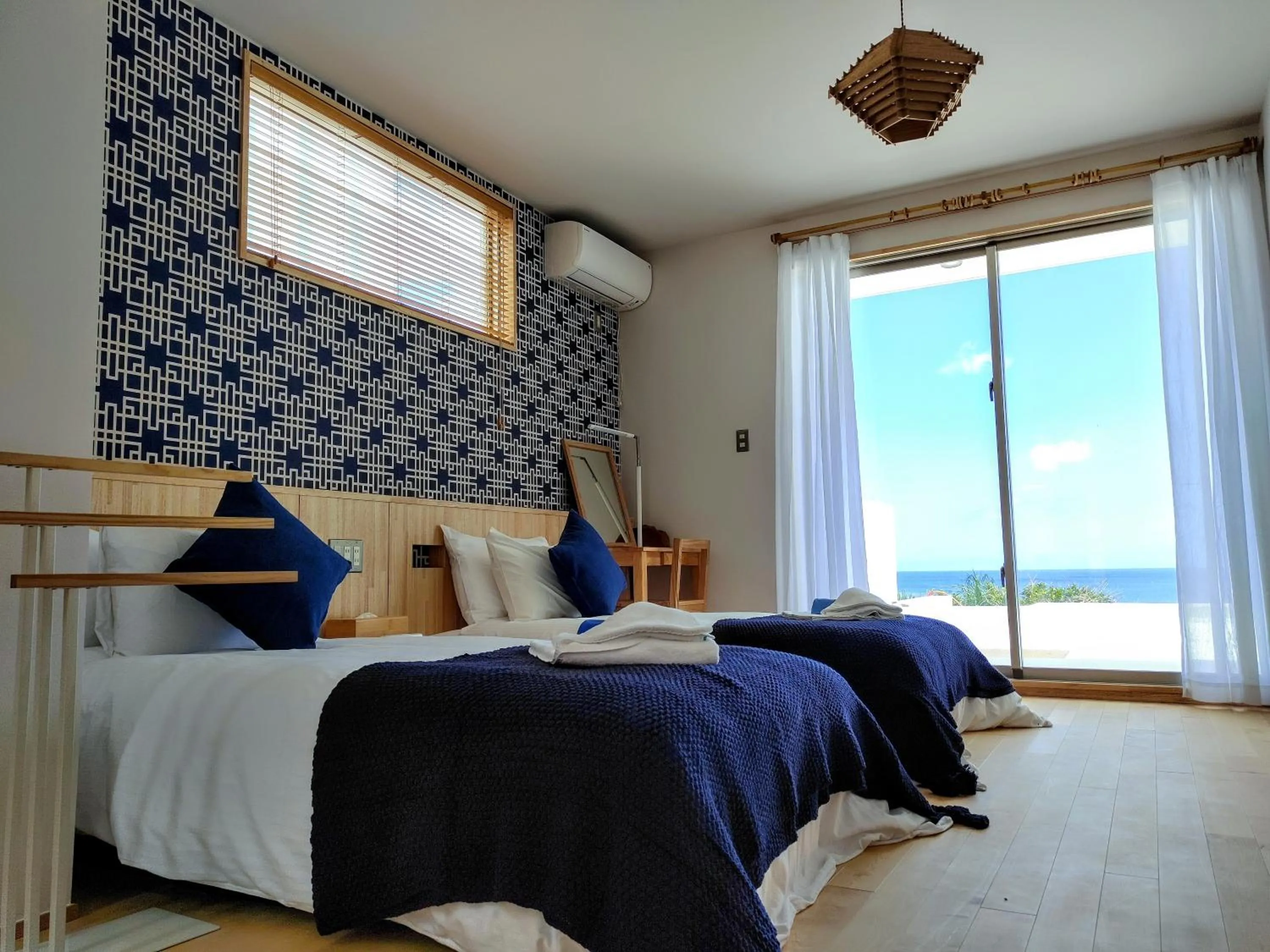 Bed in Ocean View Ishigaki Sora and Umi