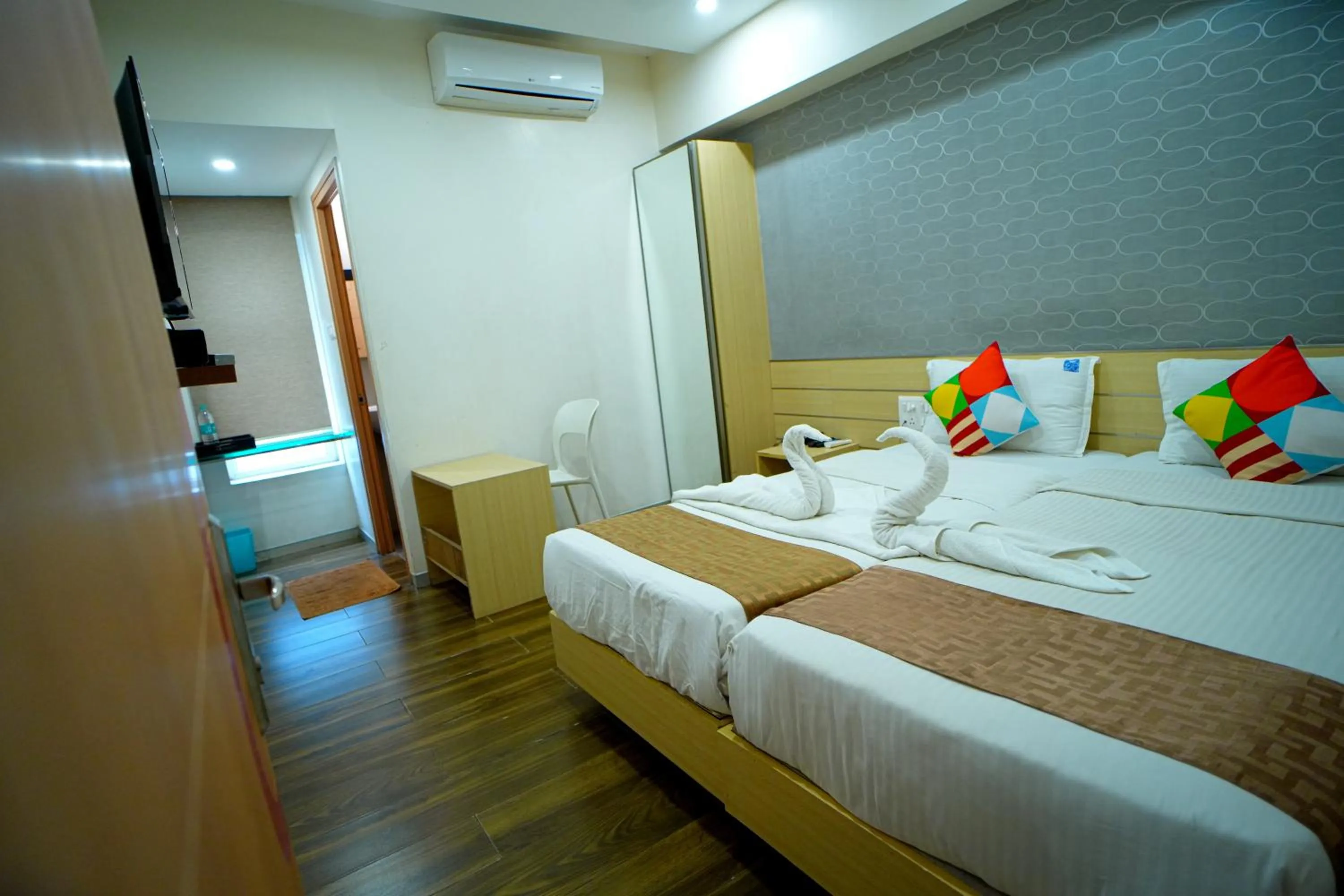 Photo of the whole room, Bed in RAAJ PEARL