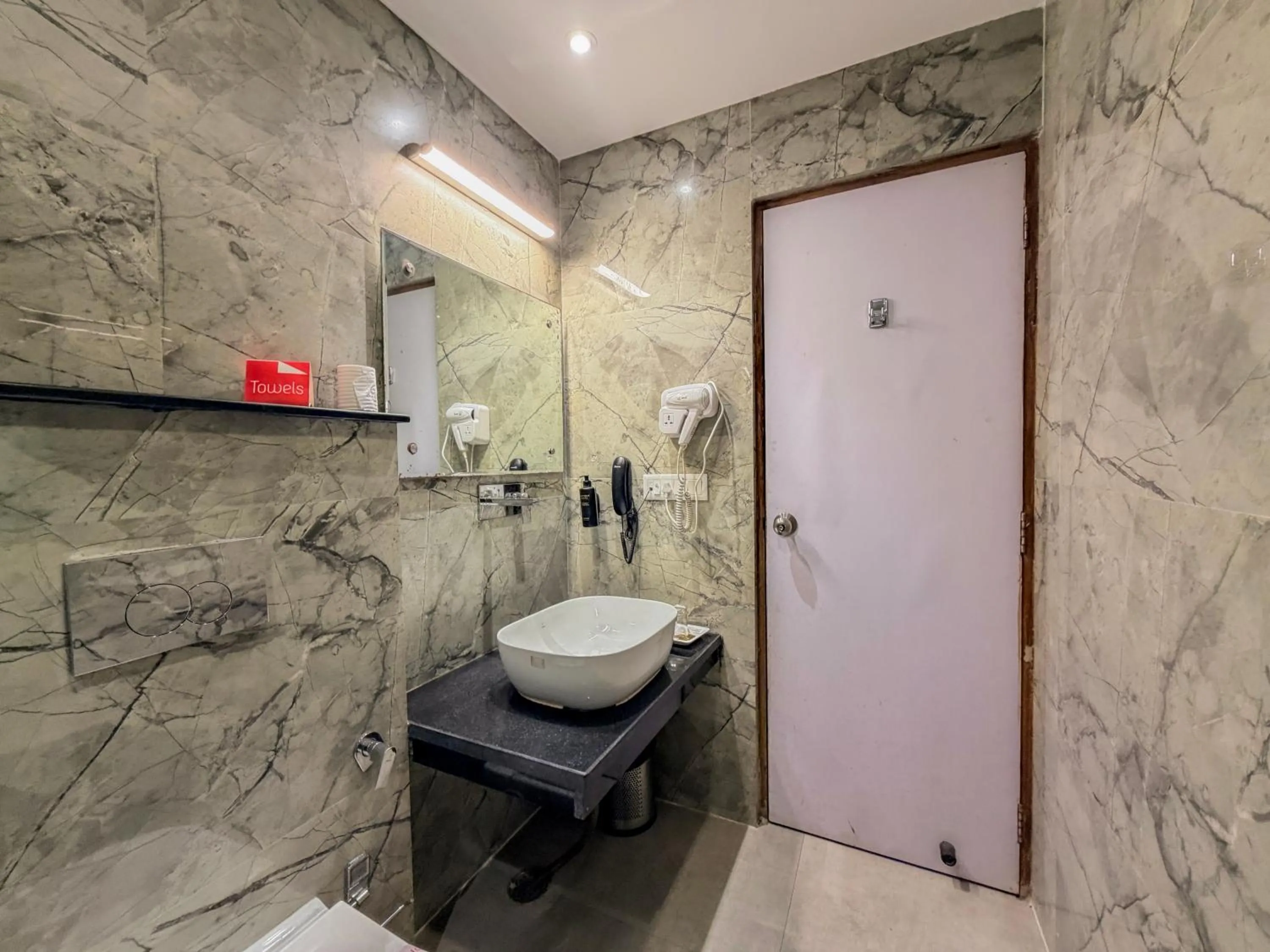 Toilet in Zip By Spree Hotels Grand Legacy Prime