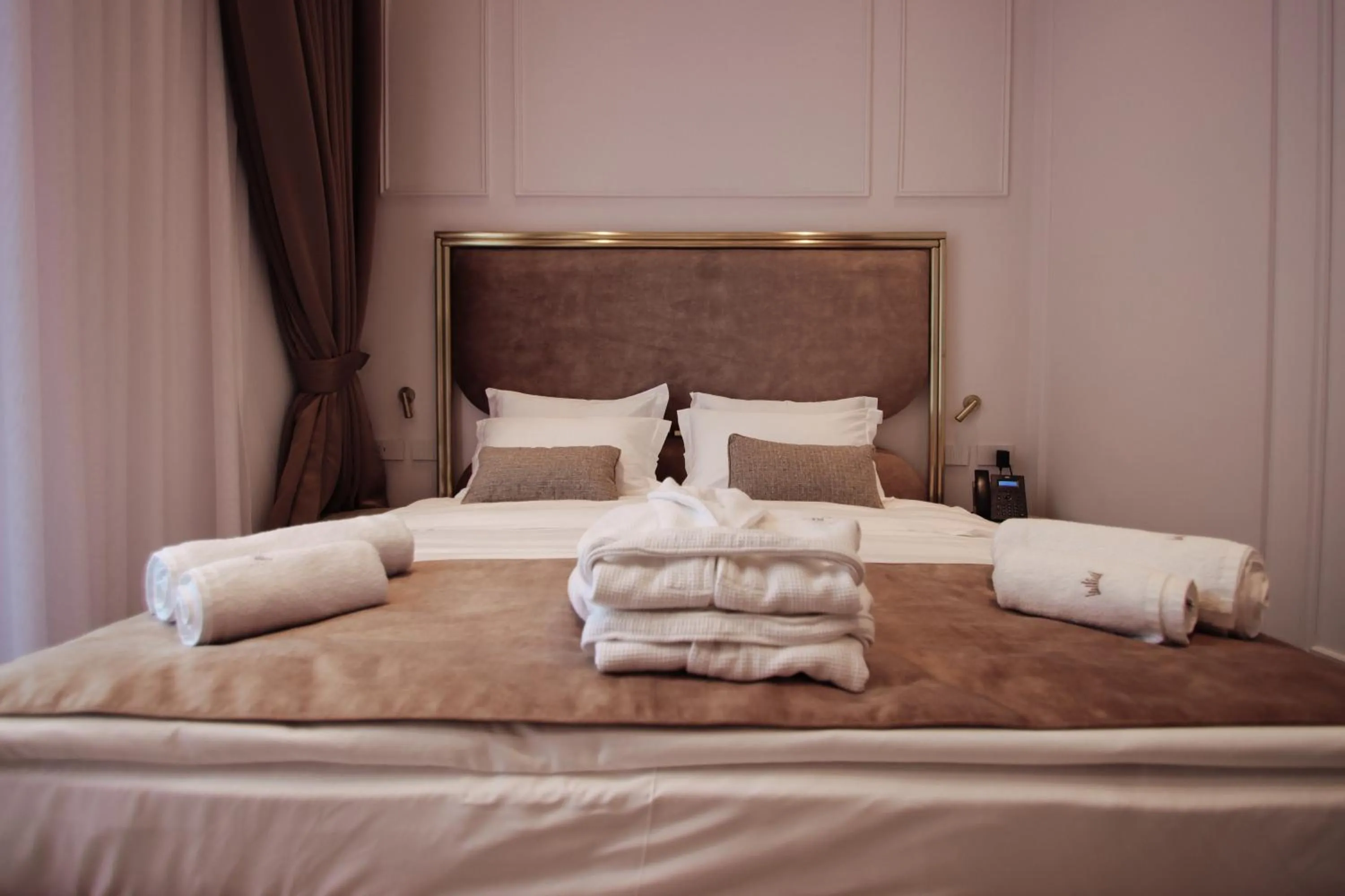 Bed in The Crown Boutique Hotel & SPA