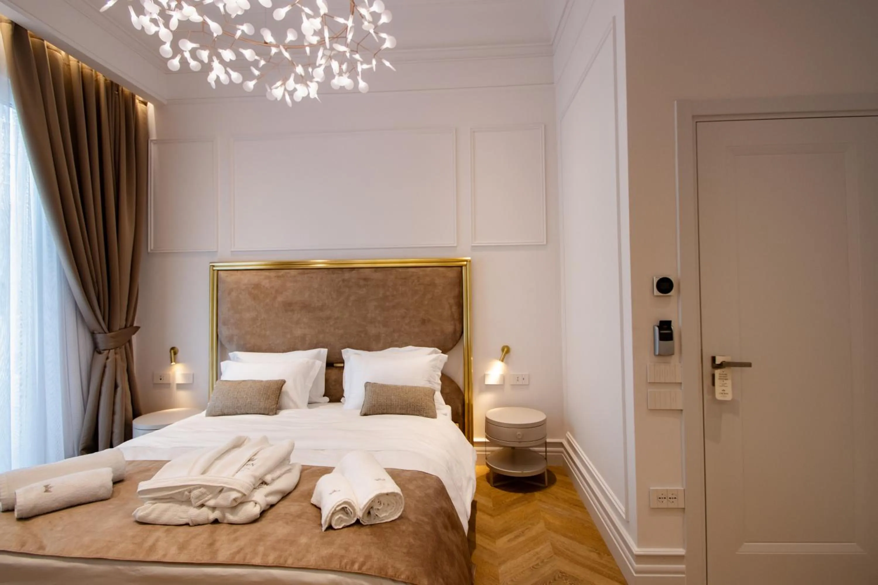 Bed in The Crown Boutique Hotel & SPA