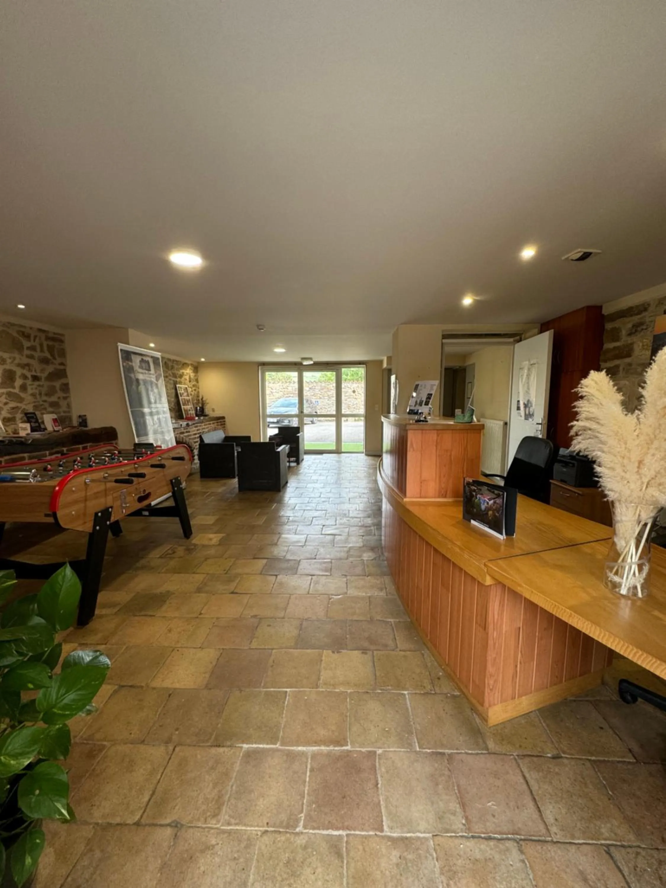 Lobby or reception in Contact Hôtel La Métairie