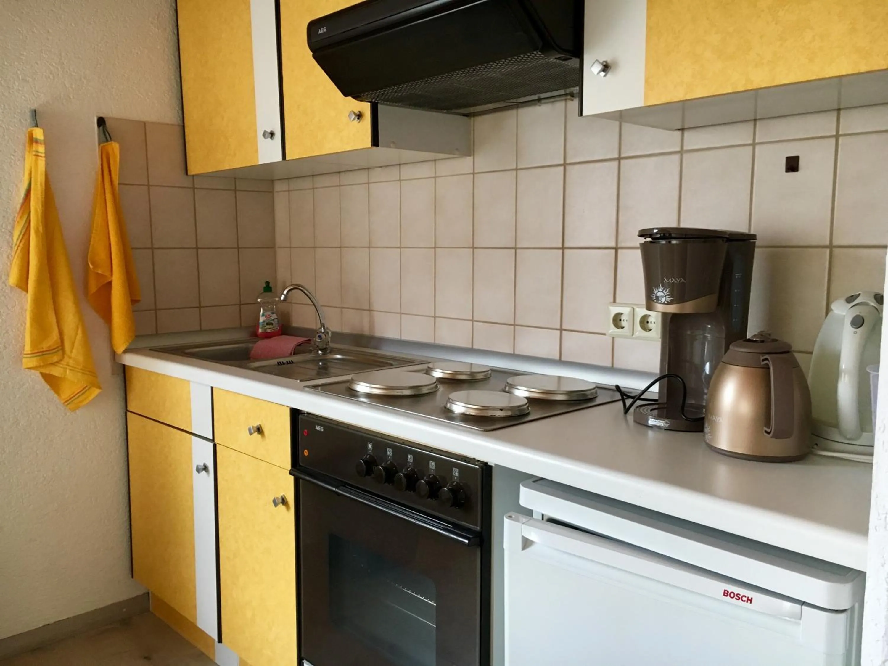 Kitchen or kitchenette in Ferienwohnung am Kirschbaum