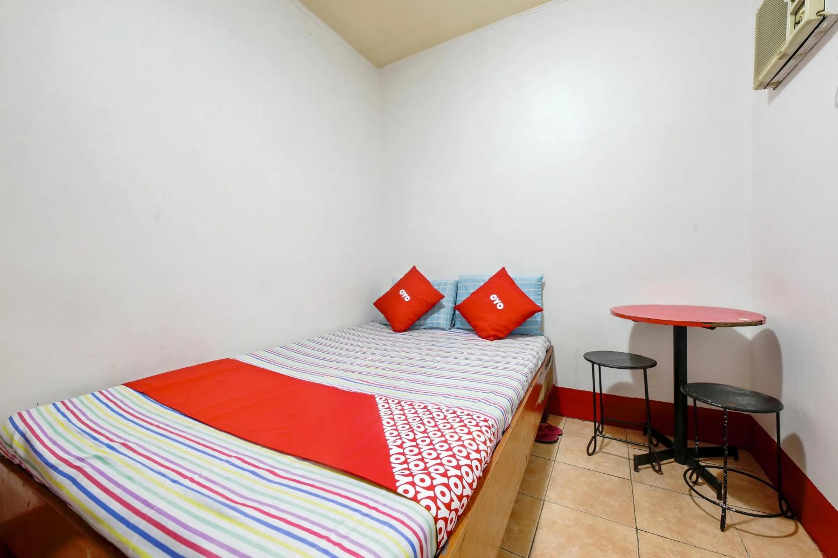 Bedroom in Busline Apartelle