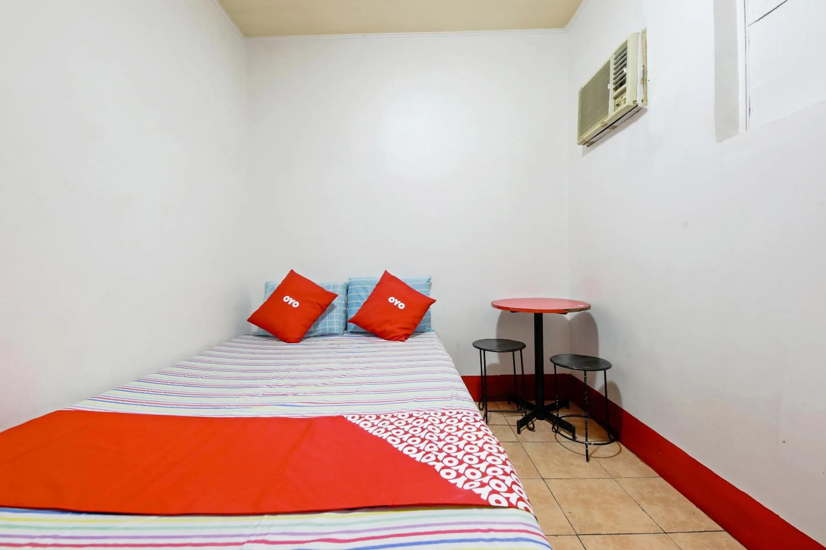 Bedroom in Busline Apartelle