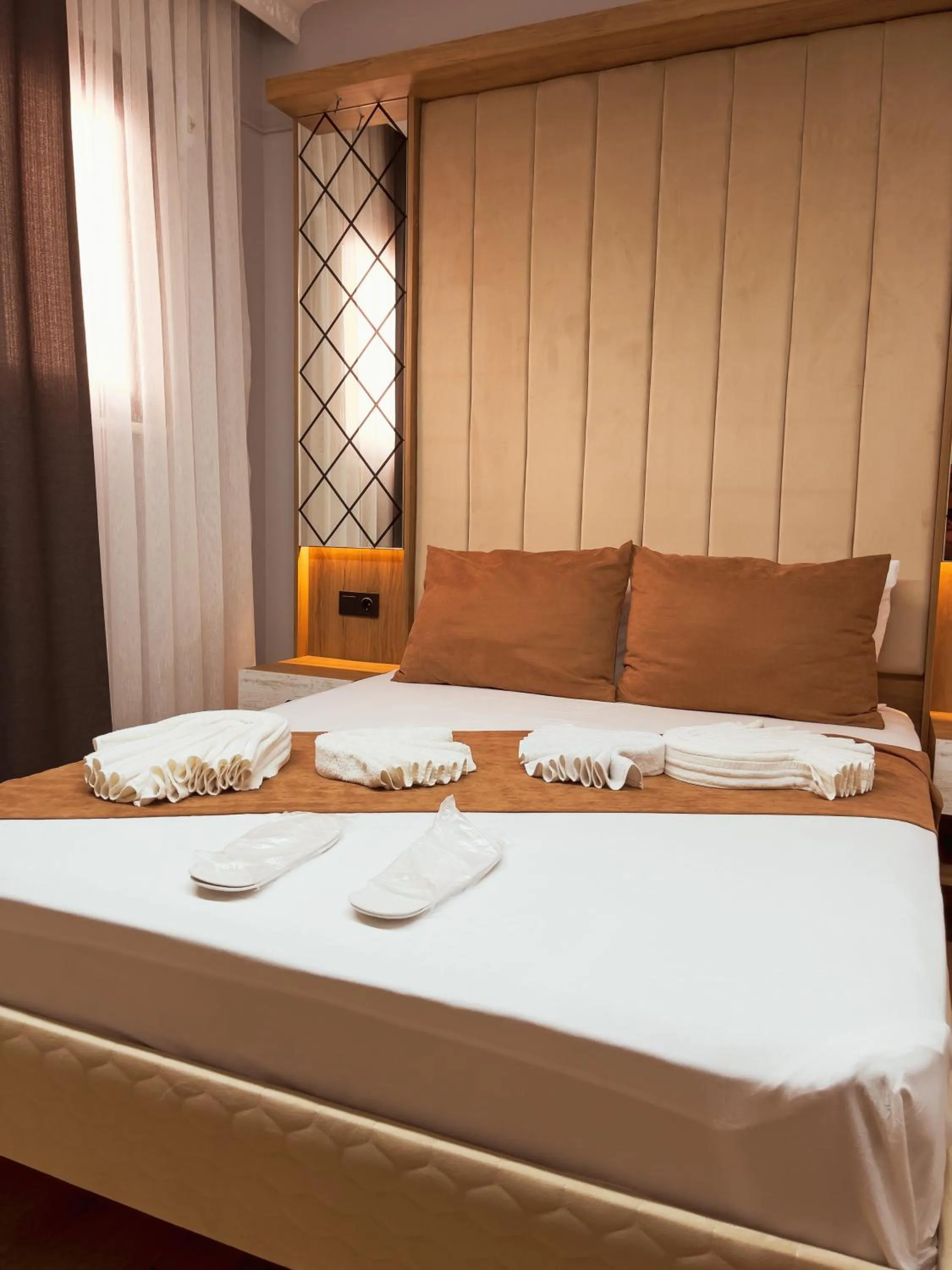 Bed in Lumina Boutique Hotel