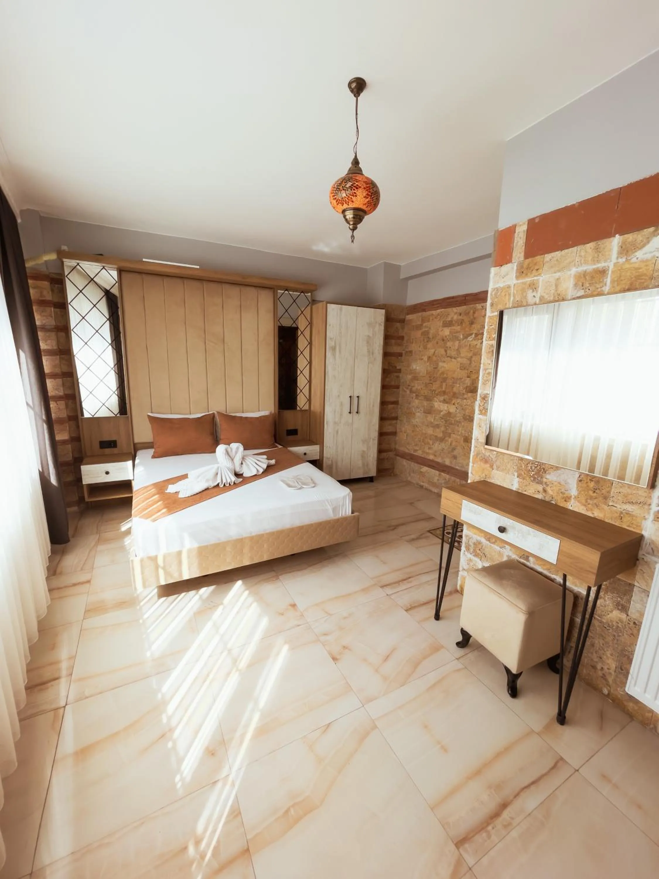 Bed in Lumina Boutique Hotel