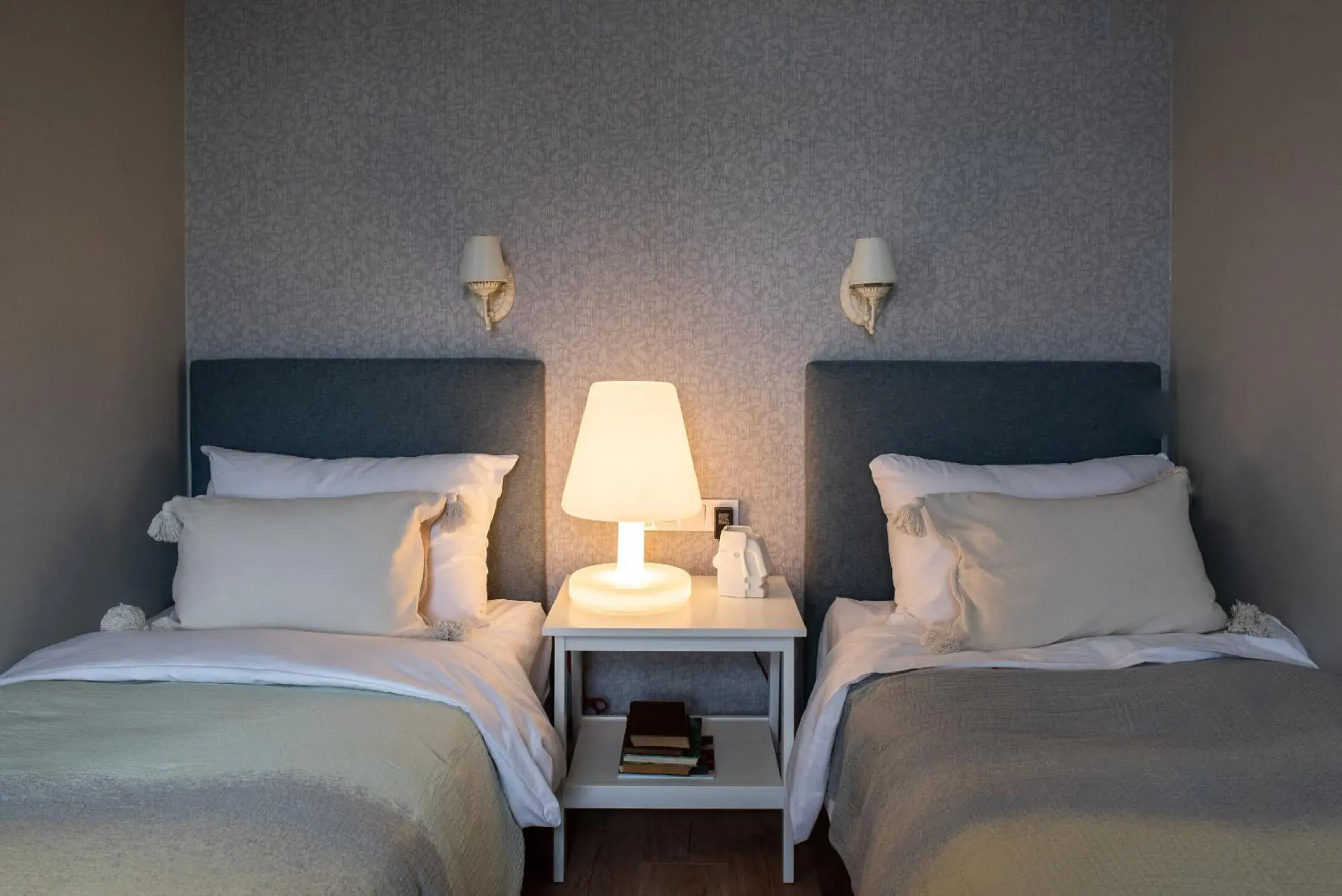 Bed in Aparthotel Amella Bed in Aparthotel Amella