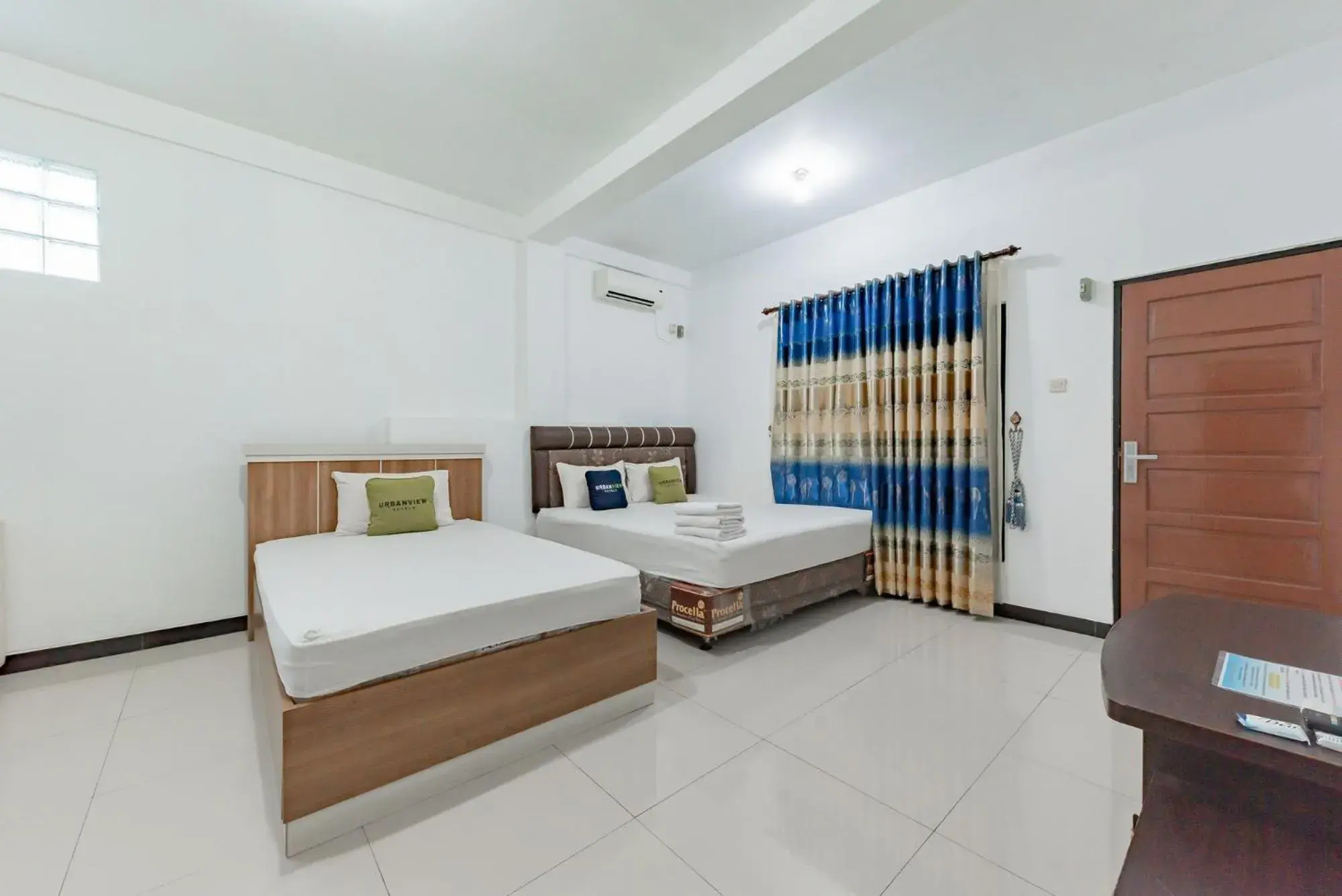 Deluxe Suite in Urbanview Hotel 99 Syariah Banjarbaru by RedDoorz Deluxe Suite in Urbanview Hotel 99 Syariah Banjarbaru by RedDoorz