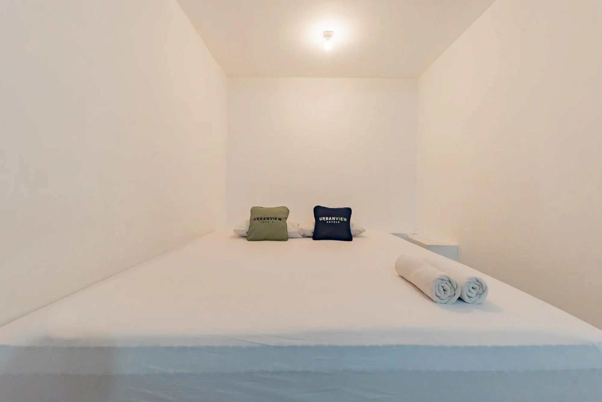 Bed in Urbanview Hotel Syariah 99 Banjarbaru by RedDoorz