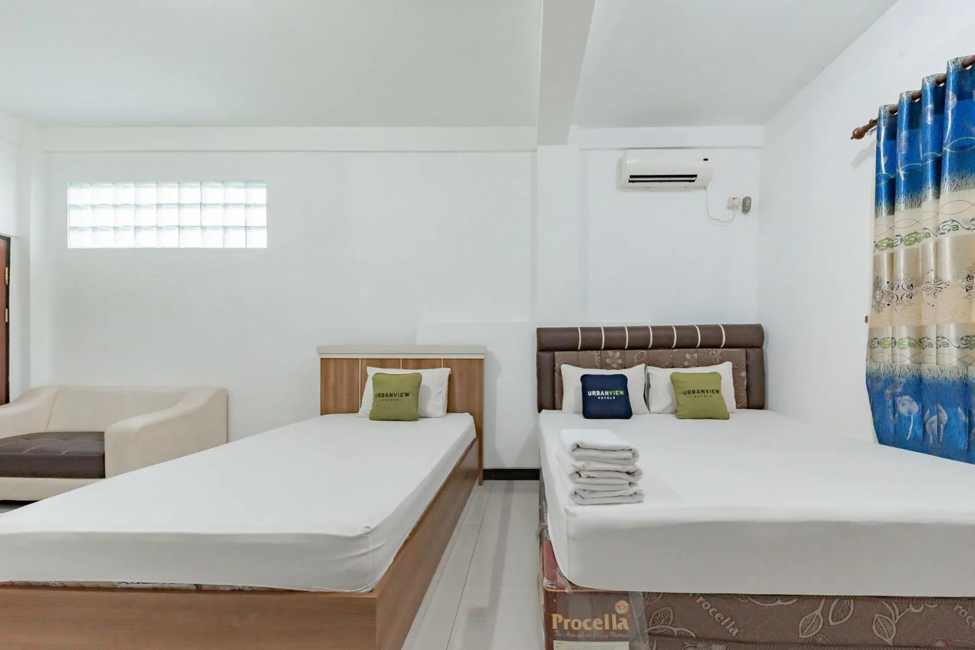 Bed in Urbanview Hotel Syariah 99 Banjarbaru by RedDoorz