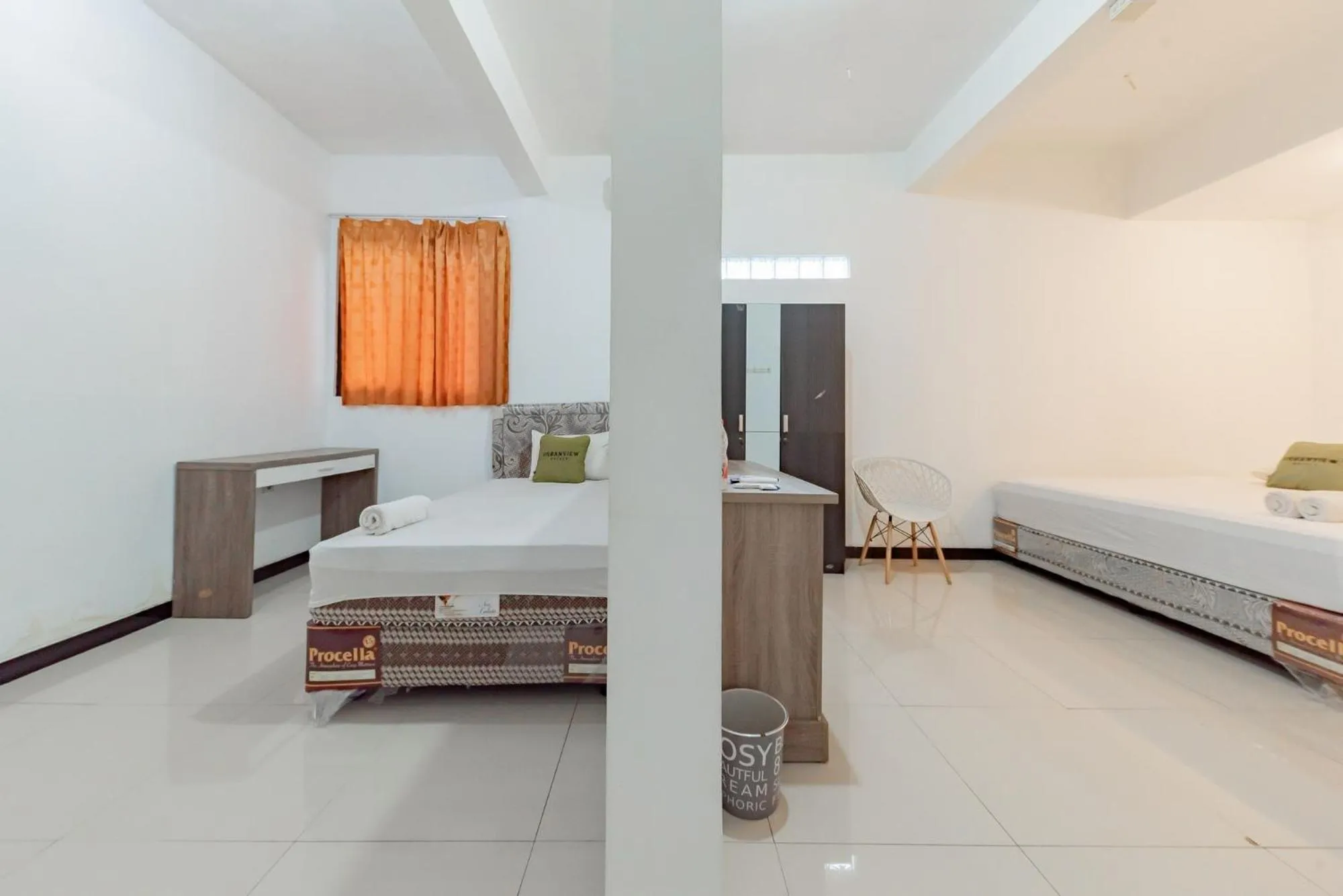 Bed in Urbanview Hotel Syariah 99 Banjarbaru by RedDoorz