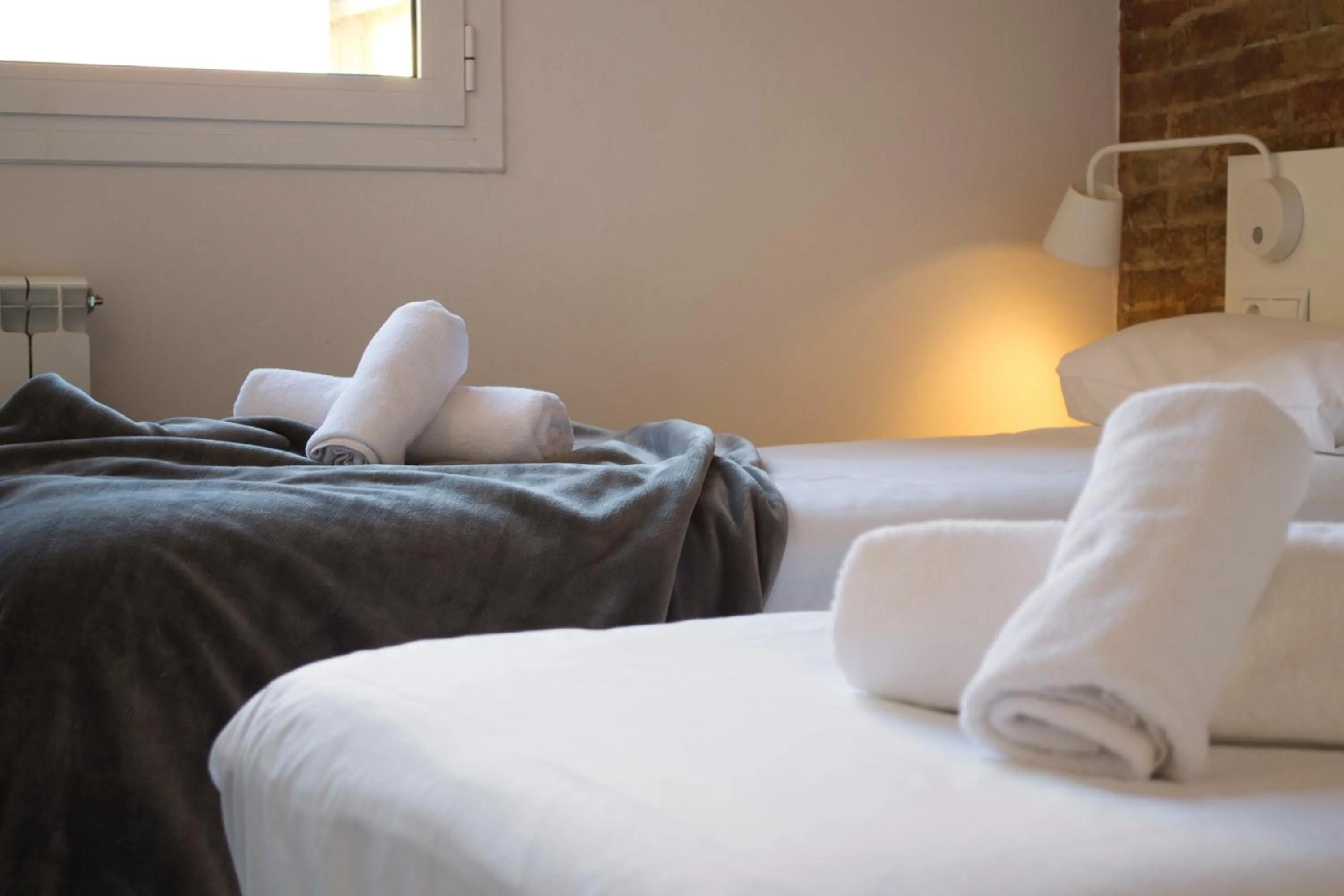 Bed in Happy People Plaza España Apartments