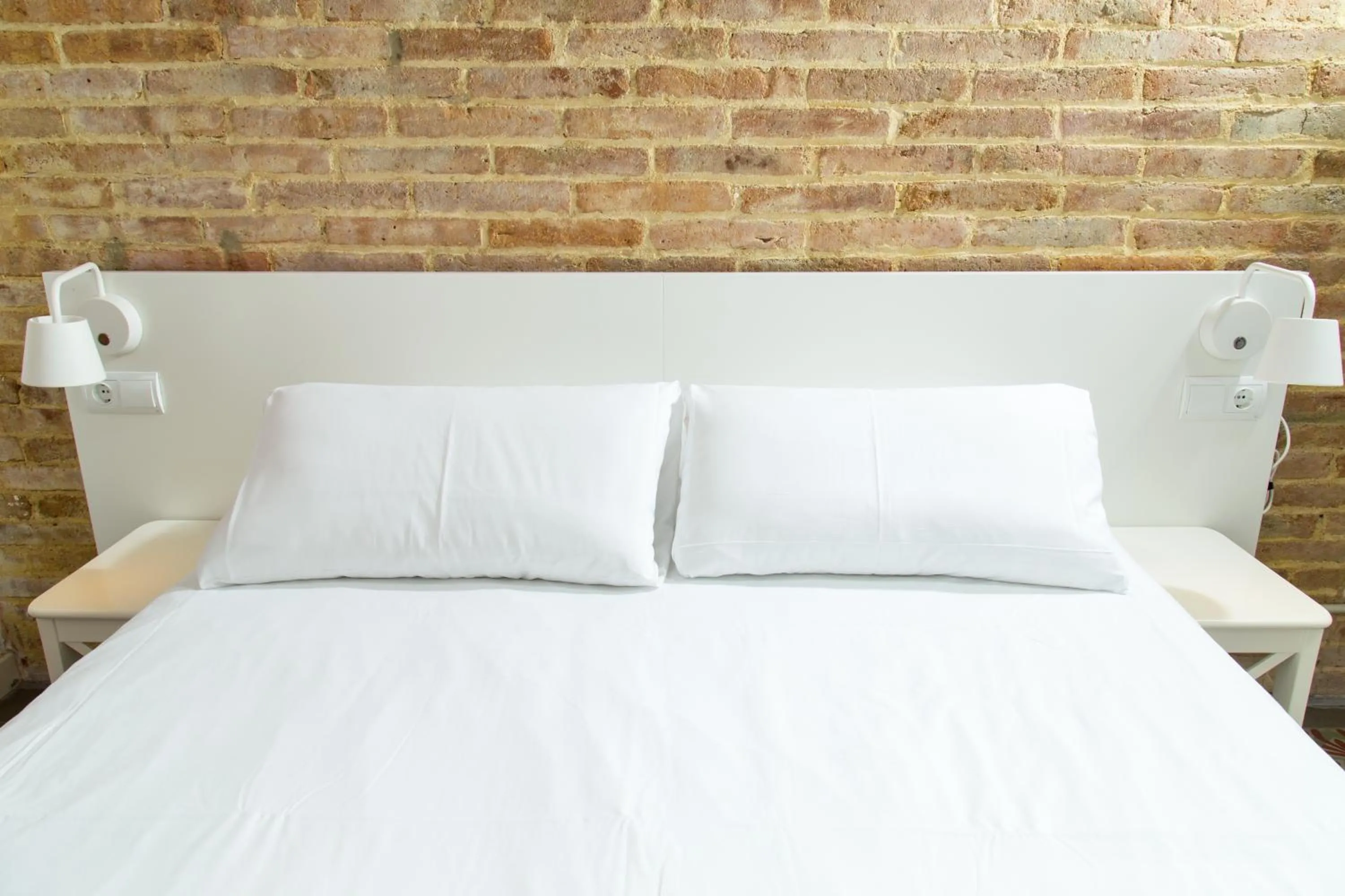 Bed in Happy People Plaza España Apartments