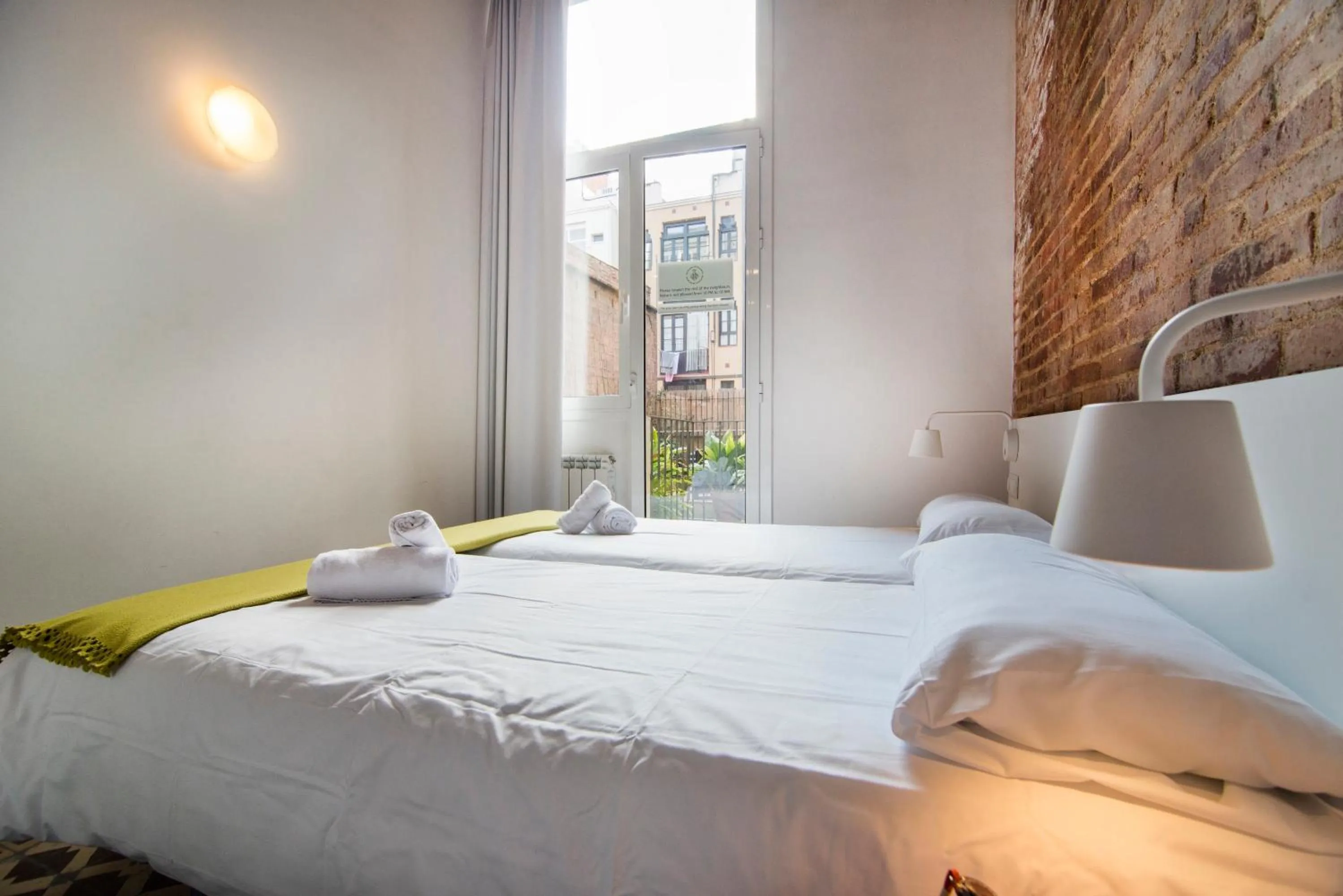Bed in Happy People Plaza España Apartments
