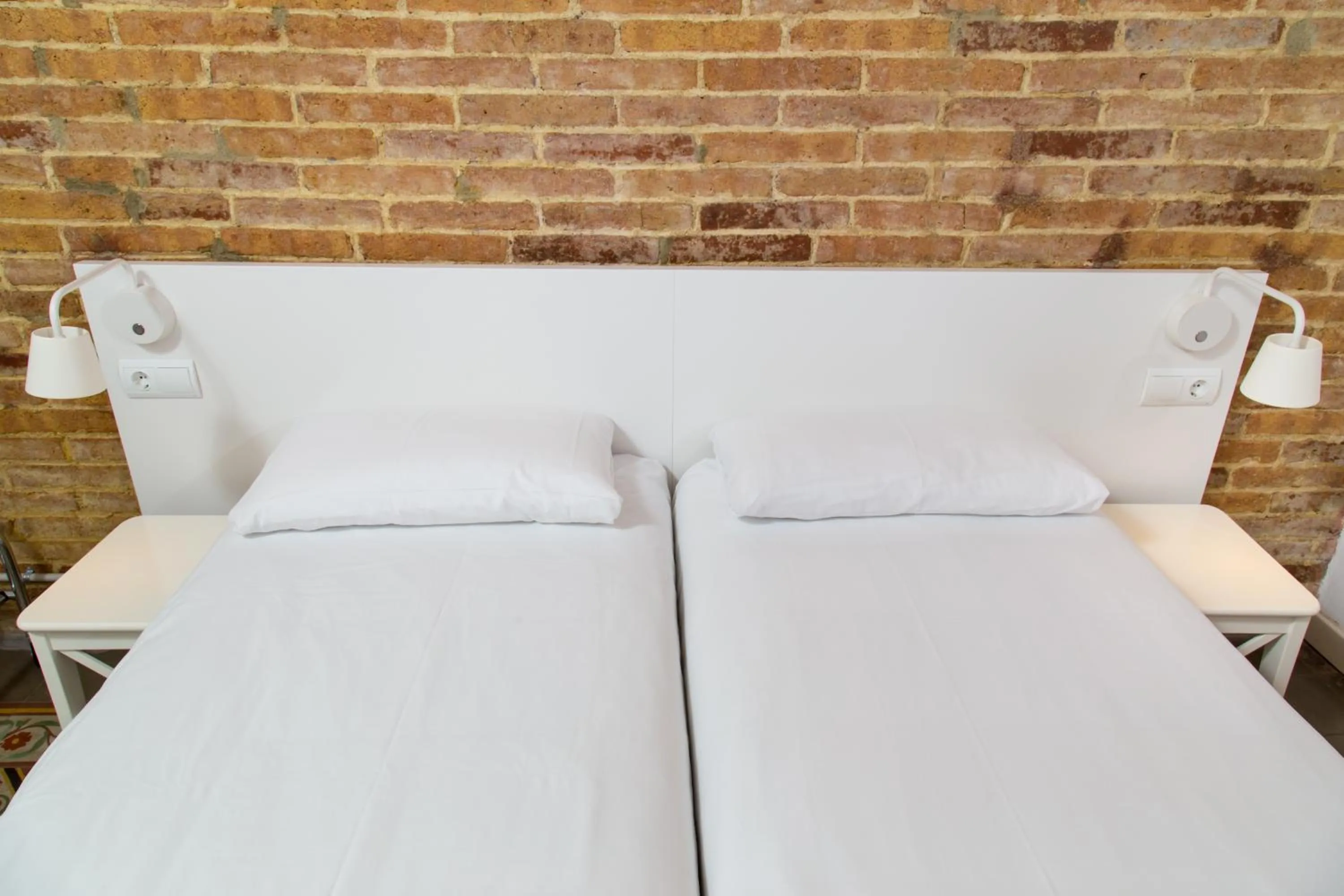 Bed in Happy People Plaza España Apartments