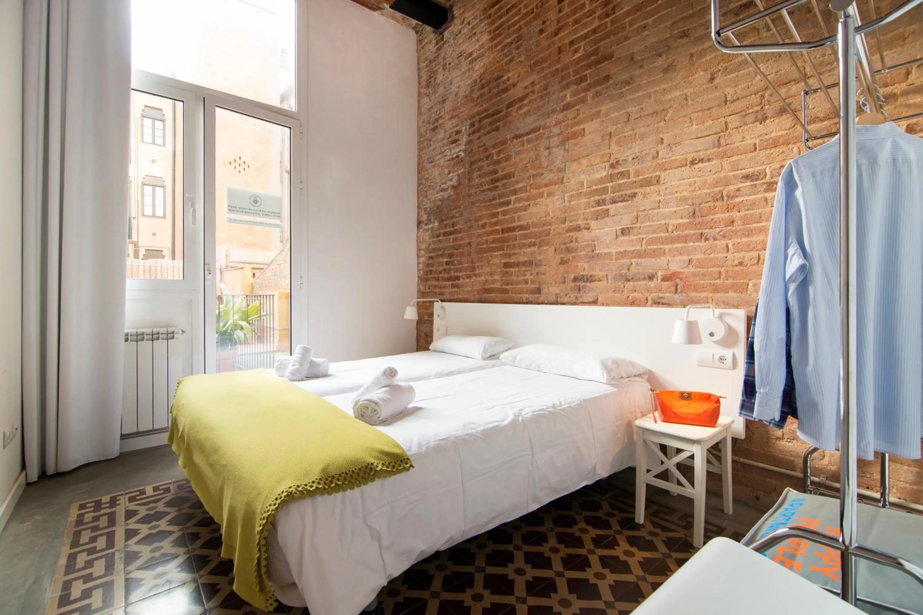 Bed in Happy People Plaza España Apartments
