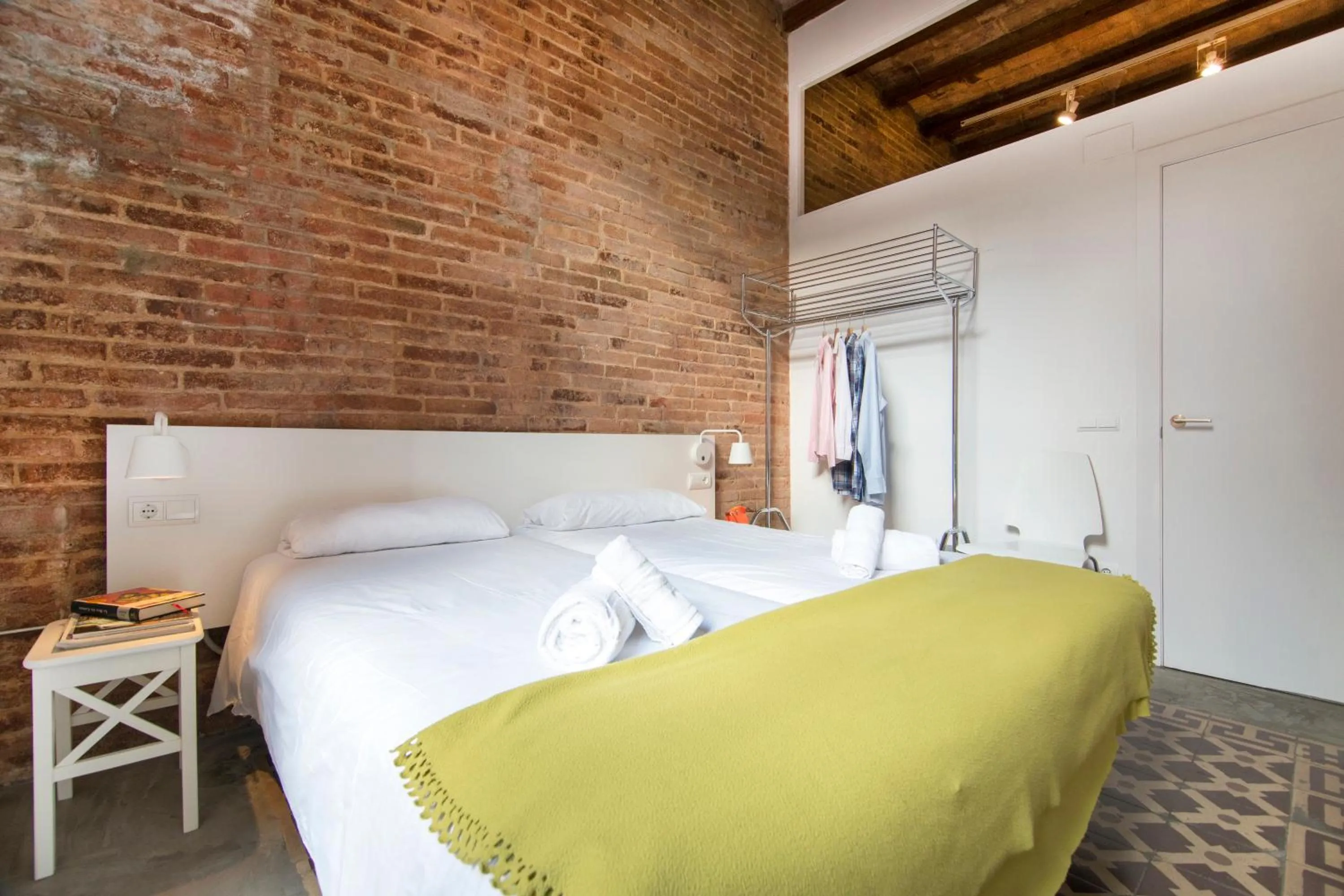Bed in Happy People Plaza España Apartments