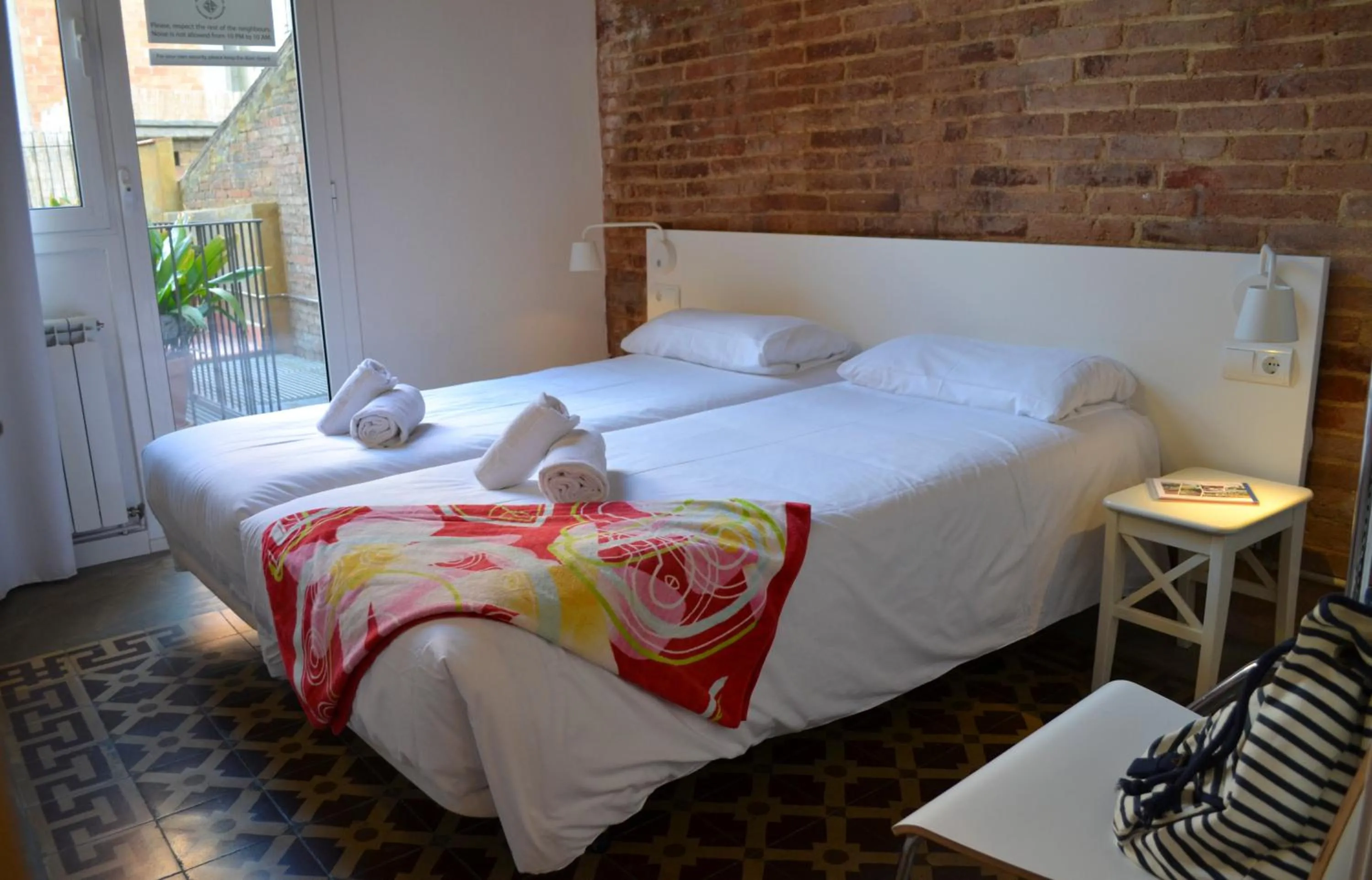Bed in Happy People Plaza España Apartments
