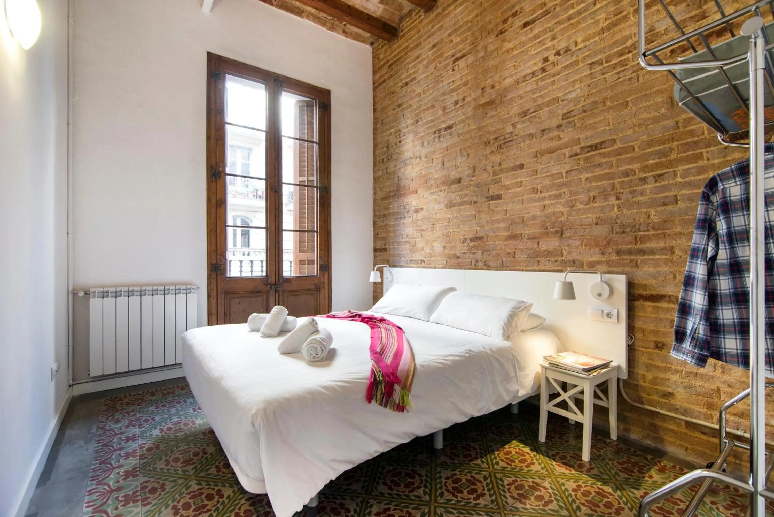 Bed in Happy People Plaza España Apartments