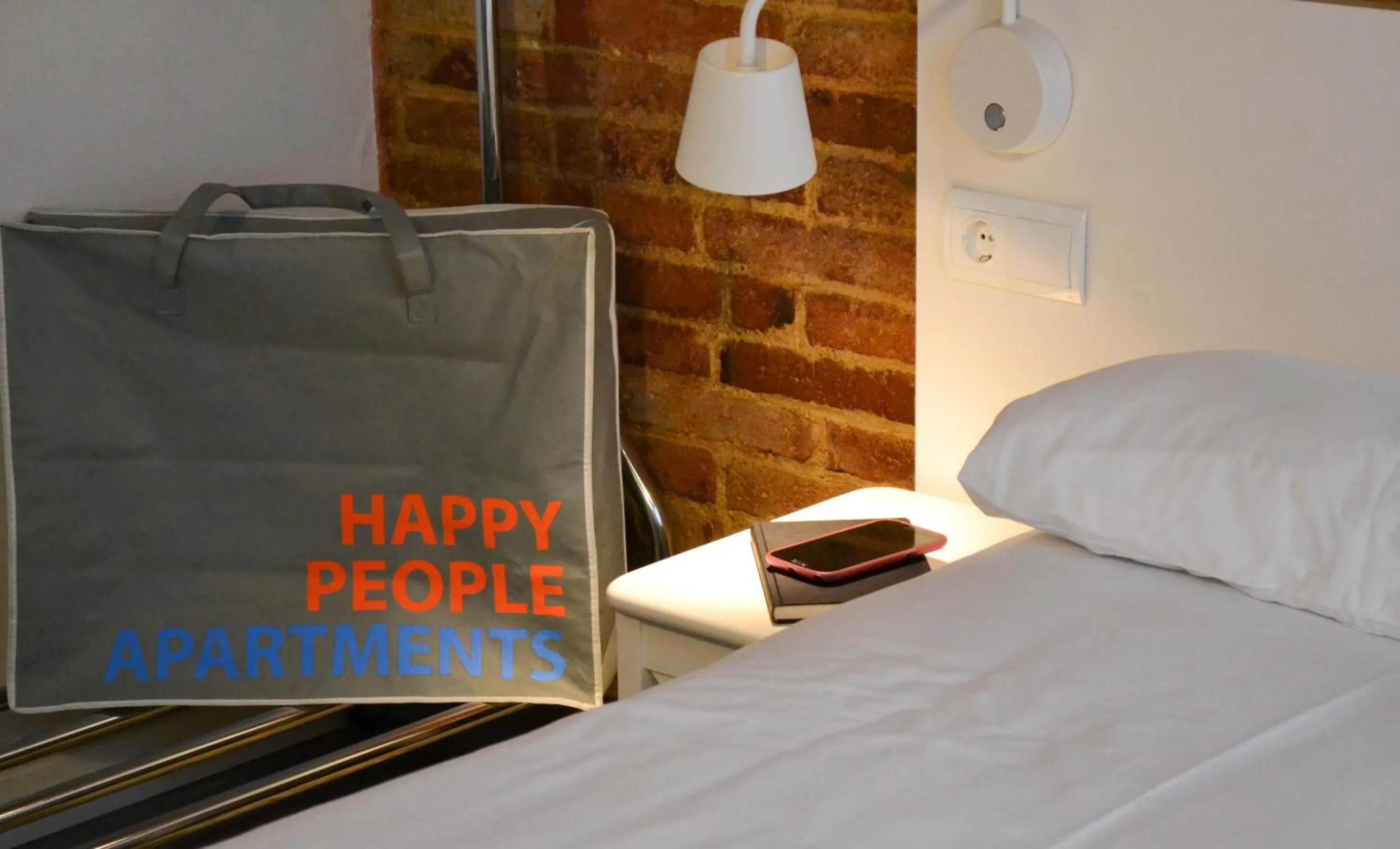 Bed in Happy People Plaza España Apartments