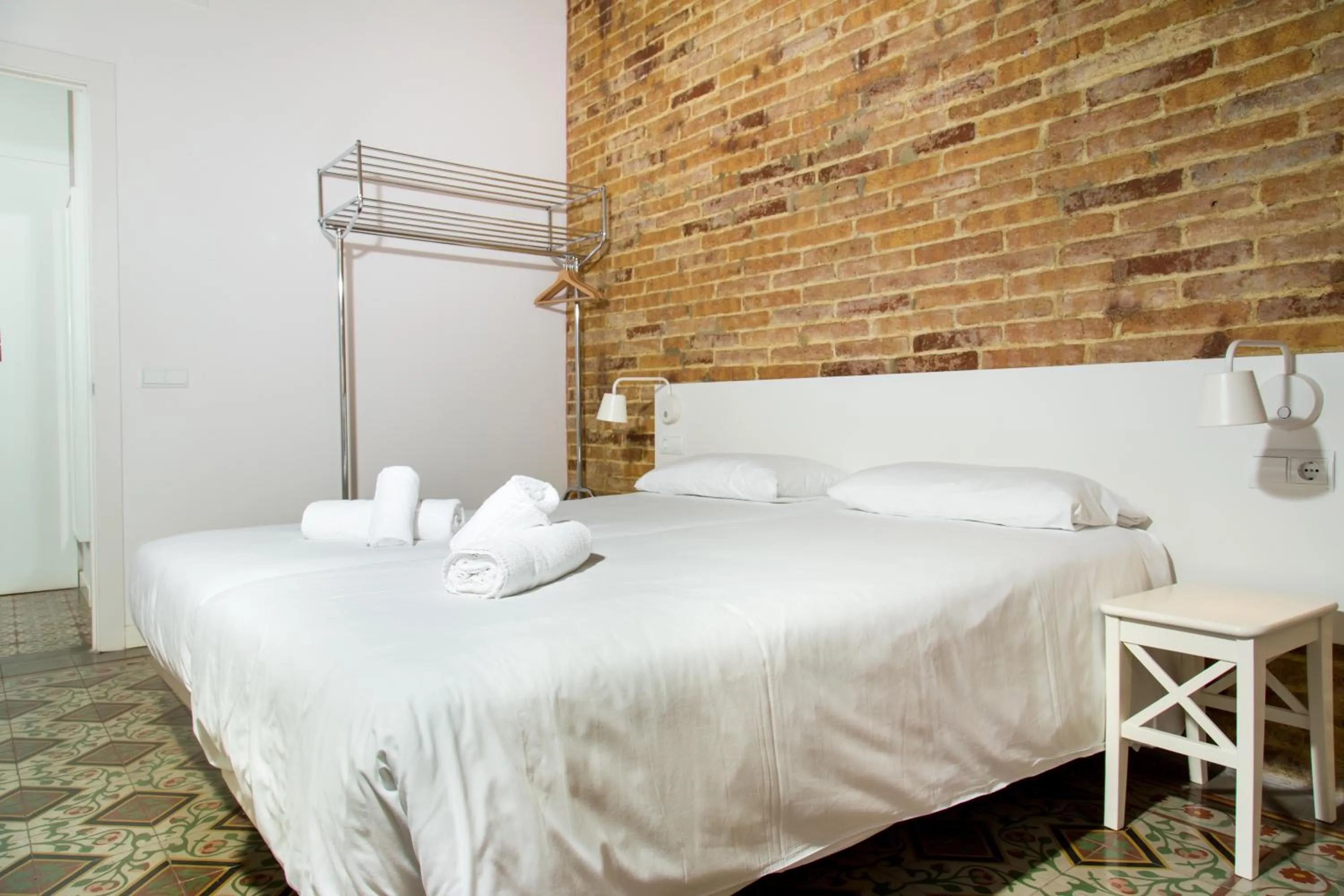 Bed in Happy People Plaza España Apartments