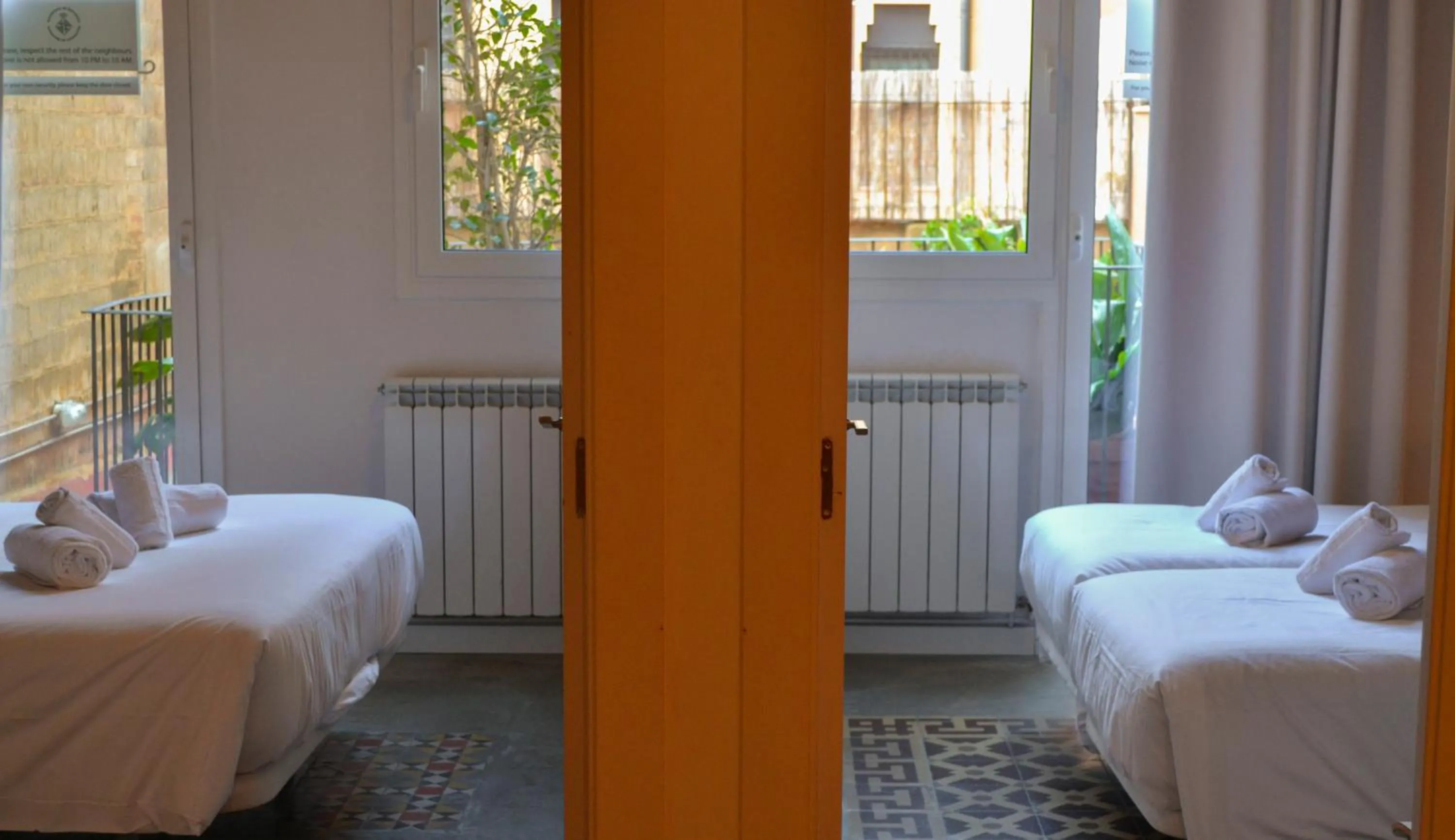 Bed in Happy People Plaza España Apartments