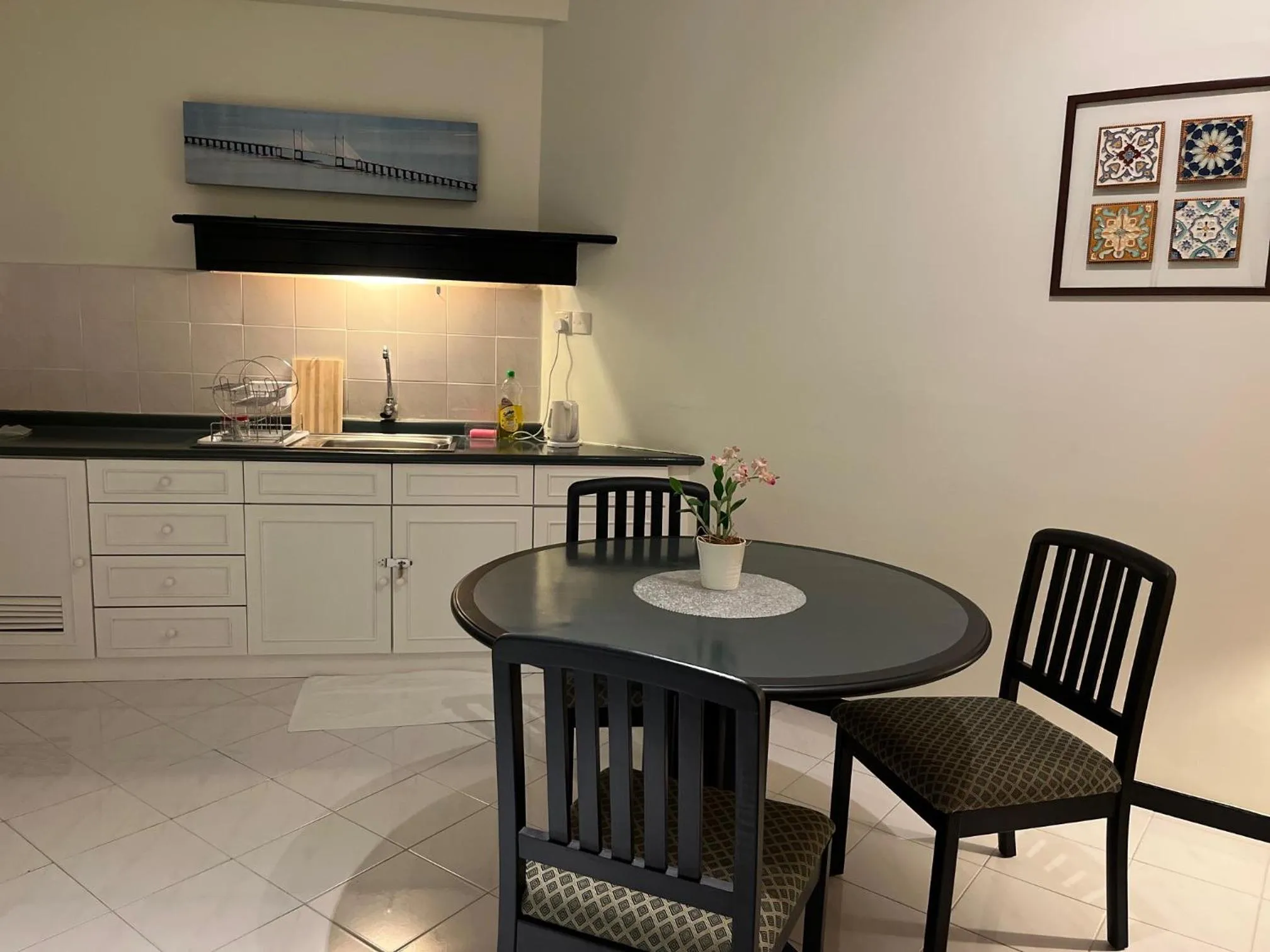 Kitchen or kitchenette in Paradise by the Sea in Penang by Veron at Rainbow Paradise