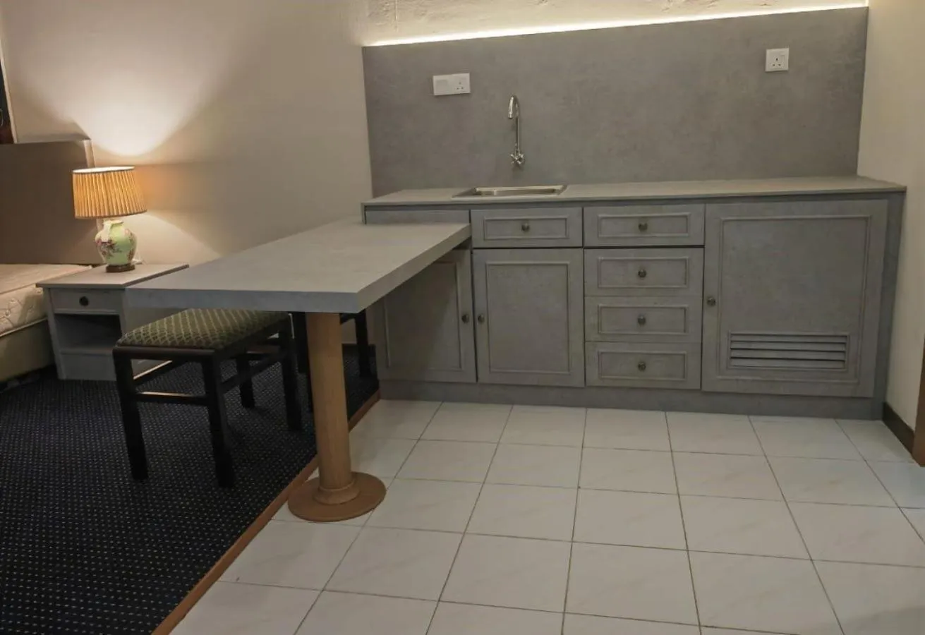 Kitchen or kitchenette in Paradise by the Sea in Penang by Veron at Rainbow Paradise