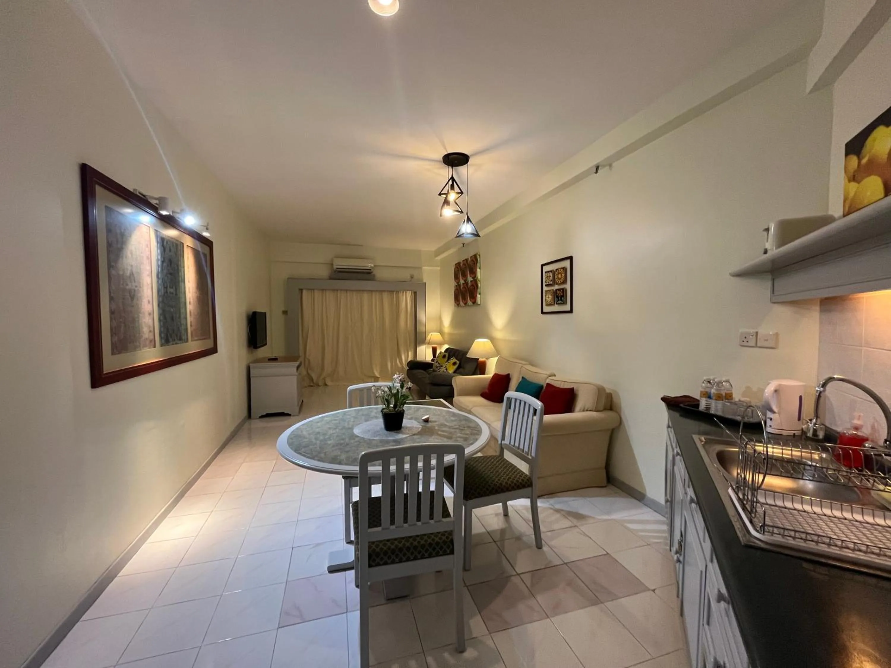 Kitchen or kitchenette in Paradise by the Sea in Penang by Veron at Rainbow Paradise