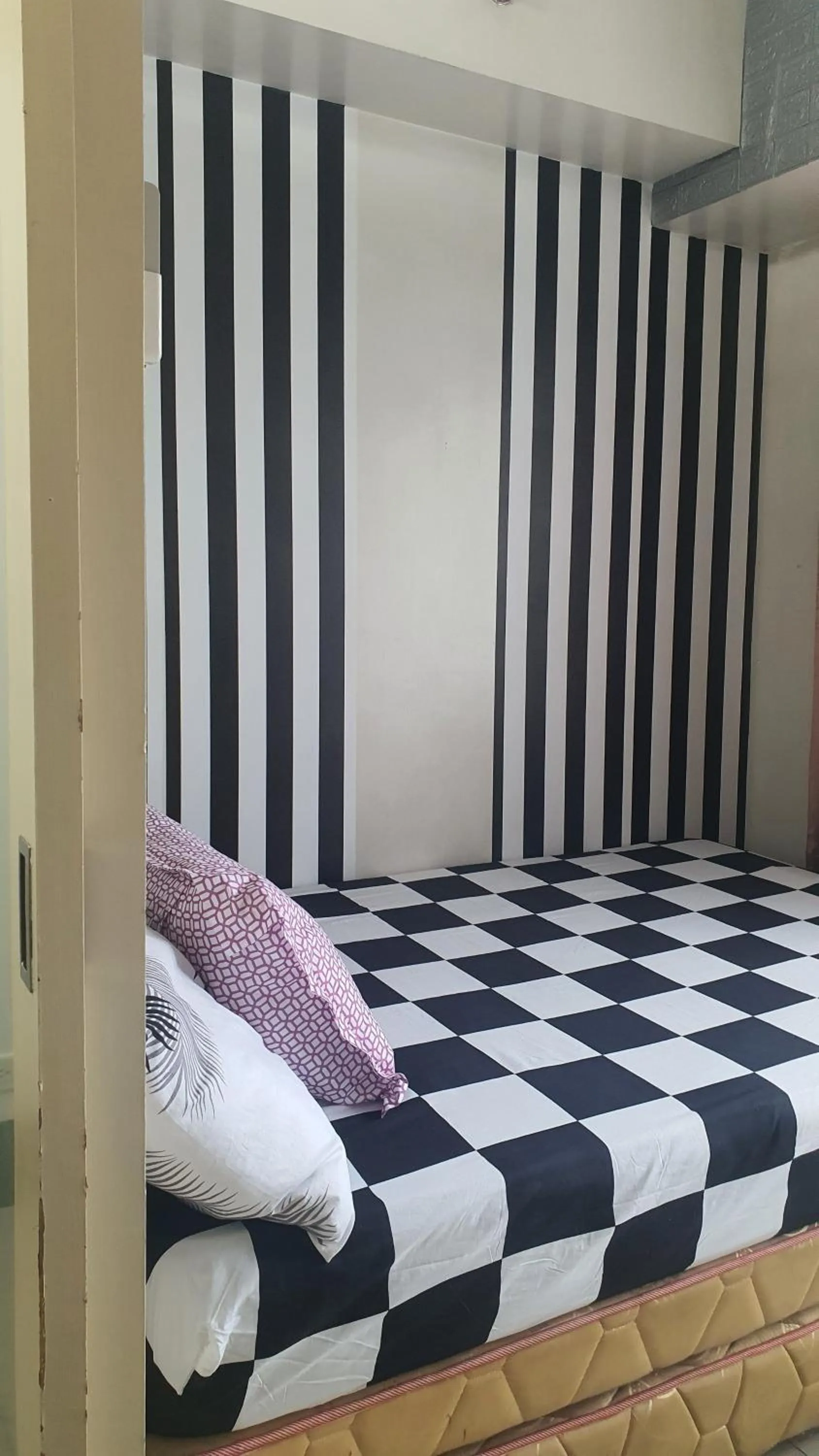 Bed in Sea Residences by EZ Stays