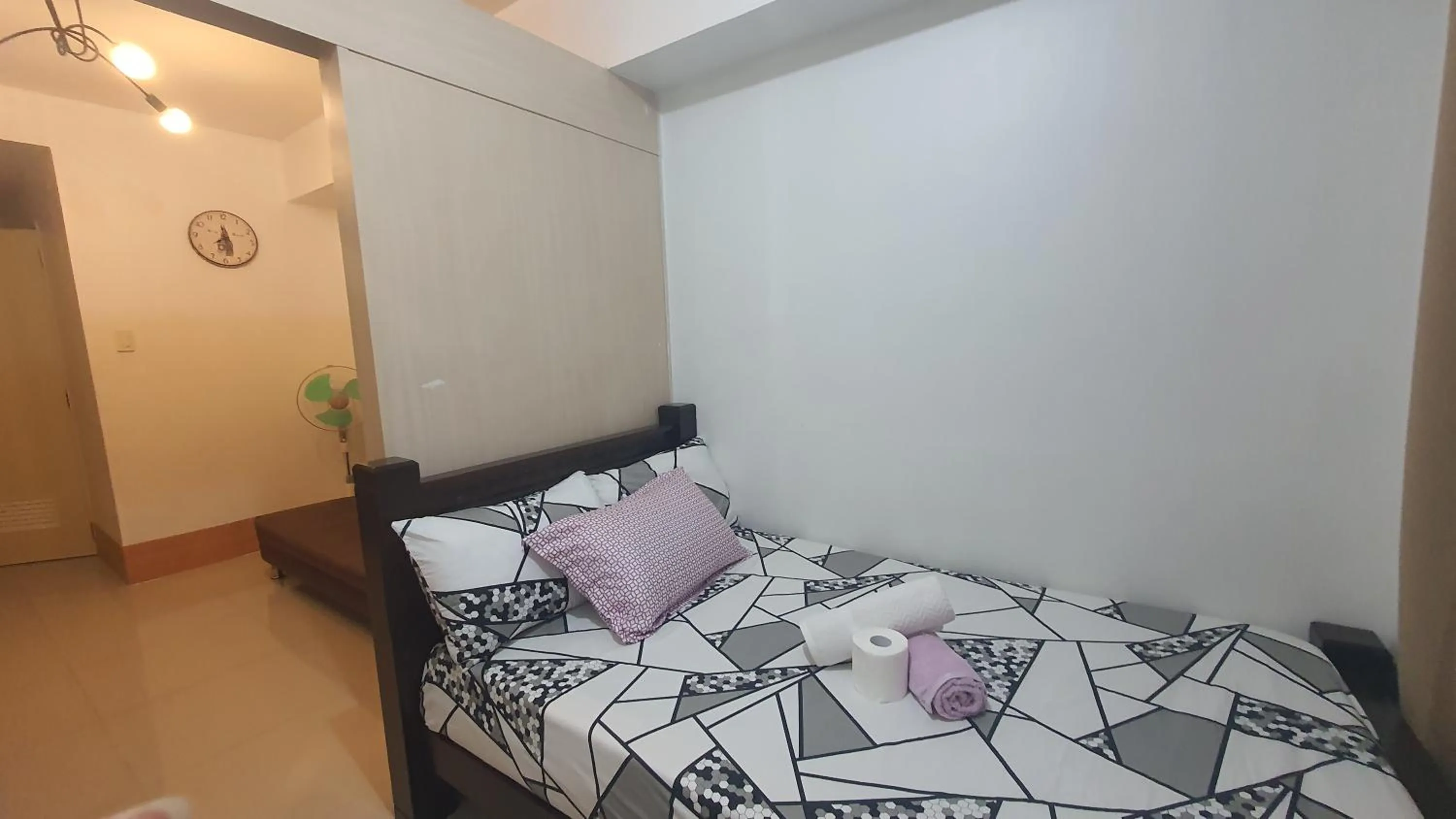 Bed in Sea Residences by EZ Stays