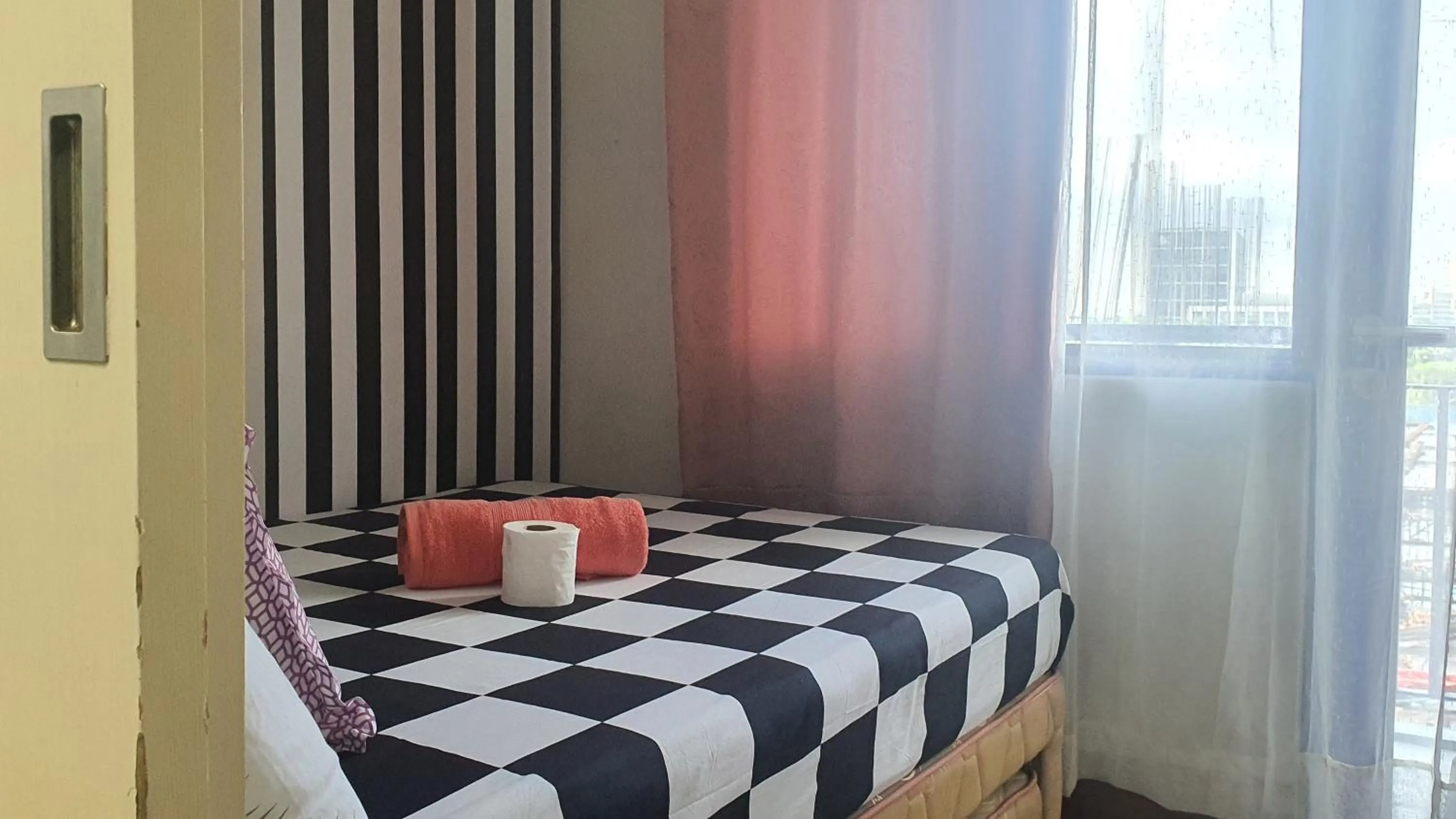 Bed in Sea Residences by EZ Stays