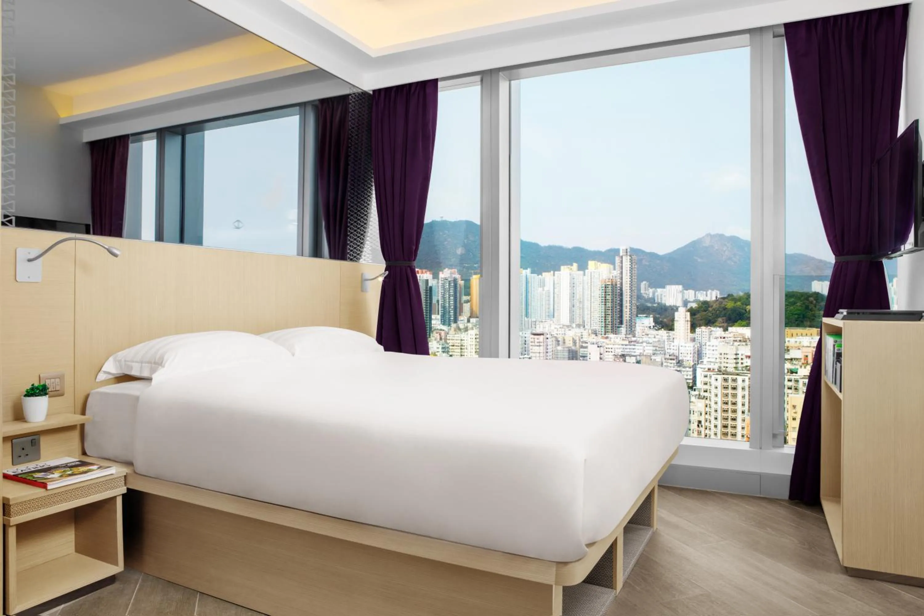 Bed in Starphire Hotel