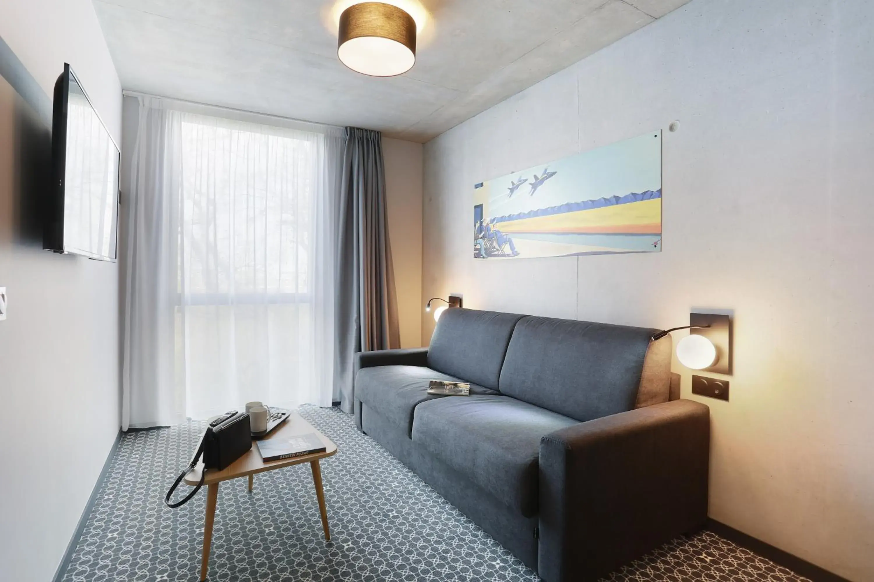 Living room in Appart Hotel Odalys City Toulouse Blagnac Aéroport Living room in Appart Hotel Odalys City Toulouse Blagnac Aéroport