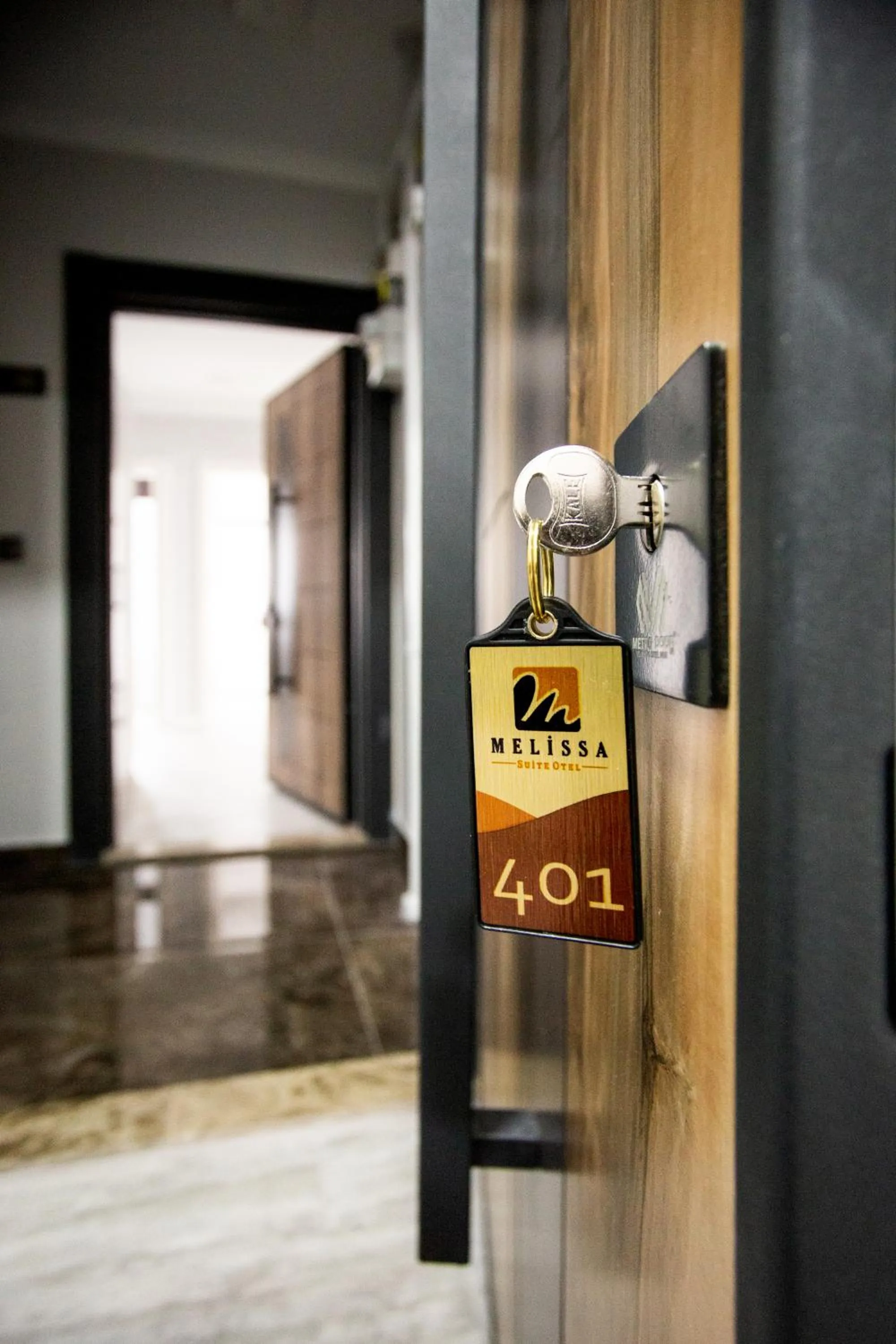 Property logo or sign in Melissa Suite