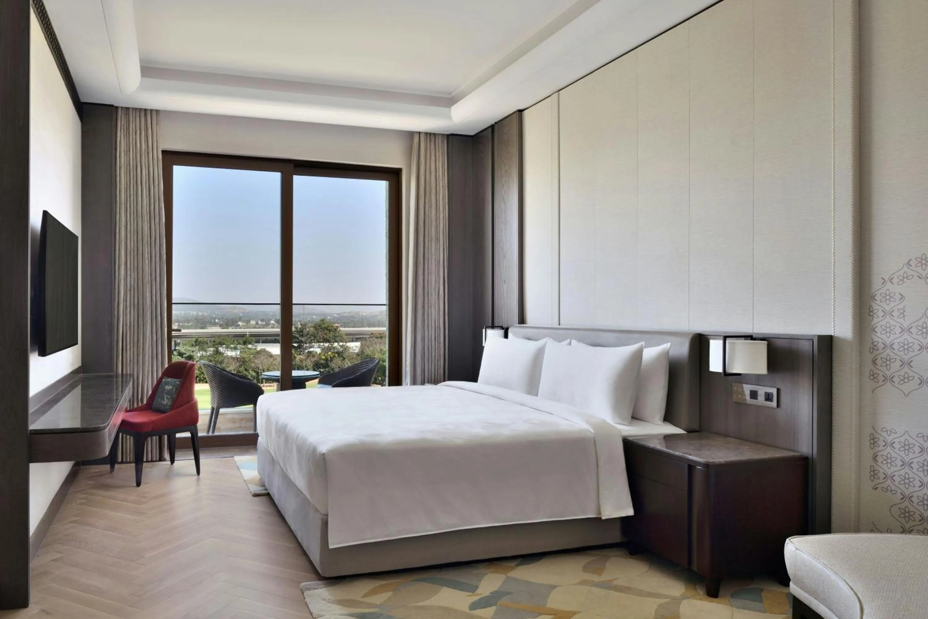 Photo of the whole room, Bed in JW Marriott Hotel Bengaluru Prestige Golfshire Resort & Spa