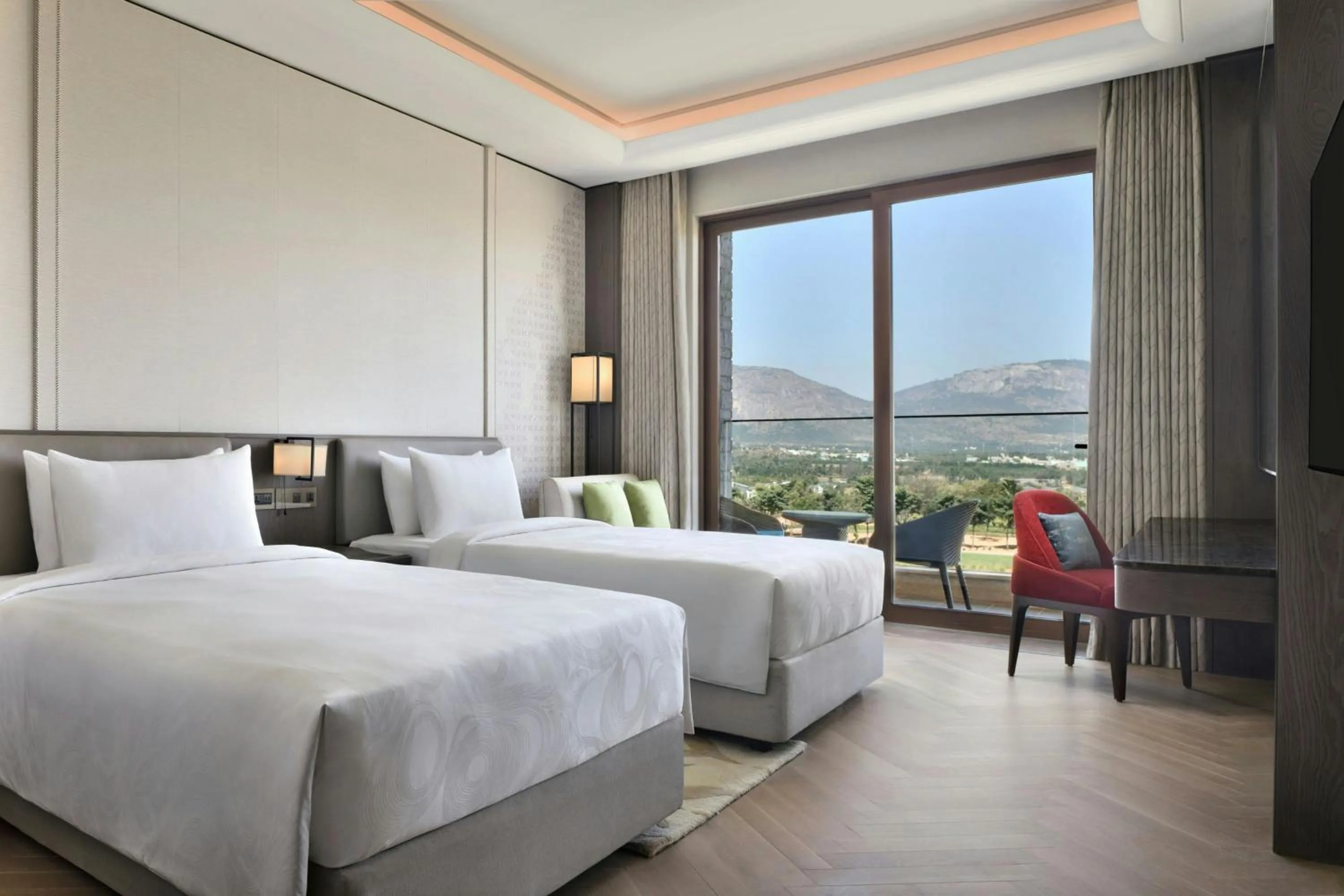 Photo of the whole room, Bed in JW Marriott Hotel Bengaluru Prestige Golfshire Resort & Spa