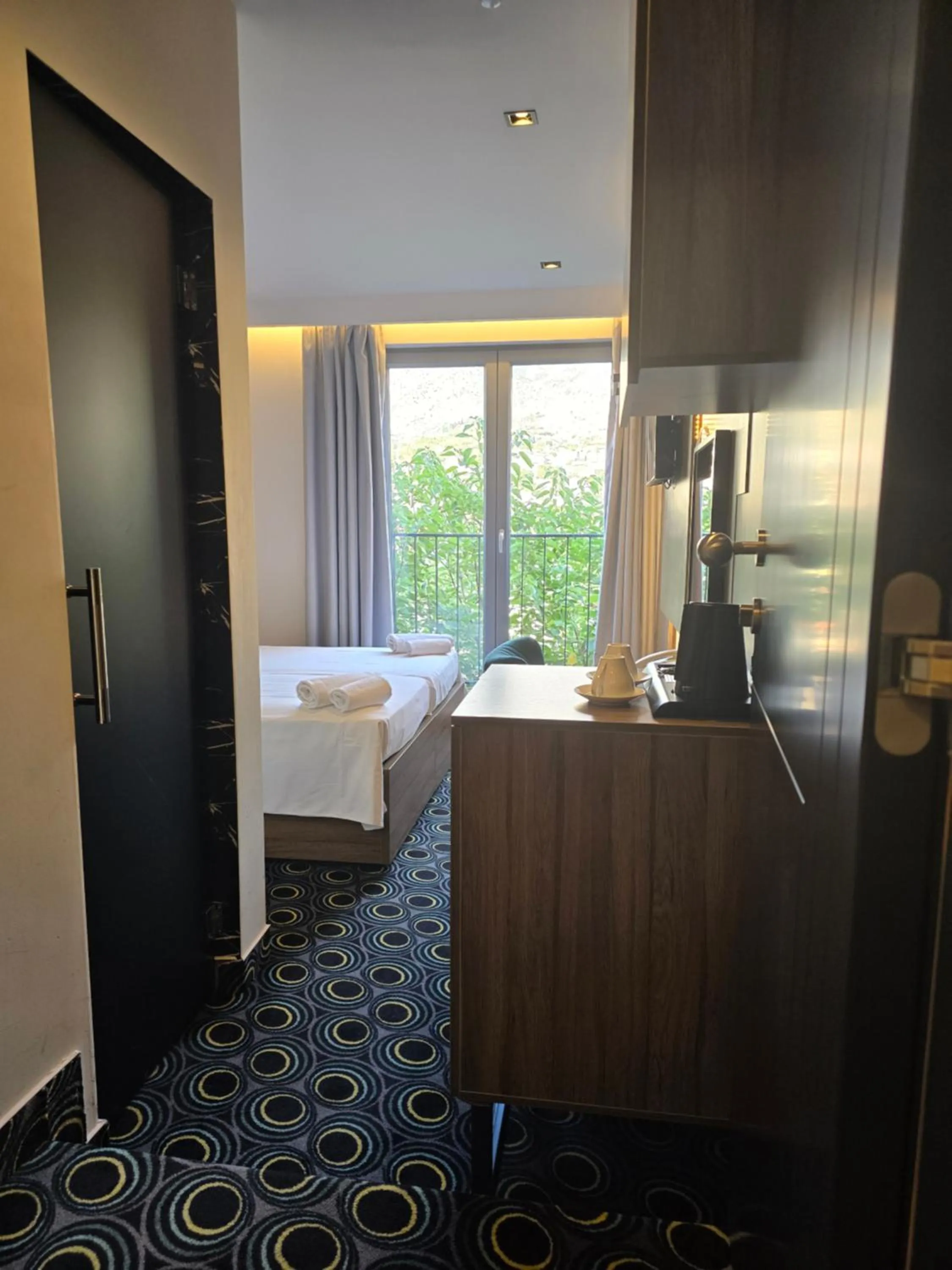 Bed in Hotel Carpe Diem