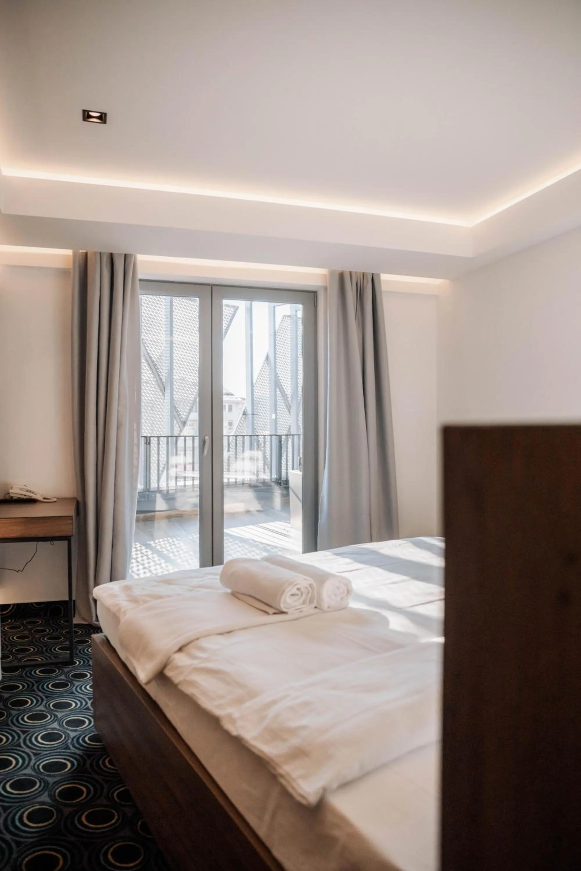 Bed in Hotel Carpe Diem