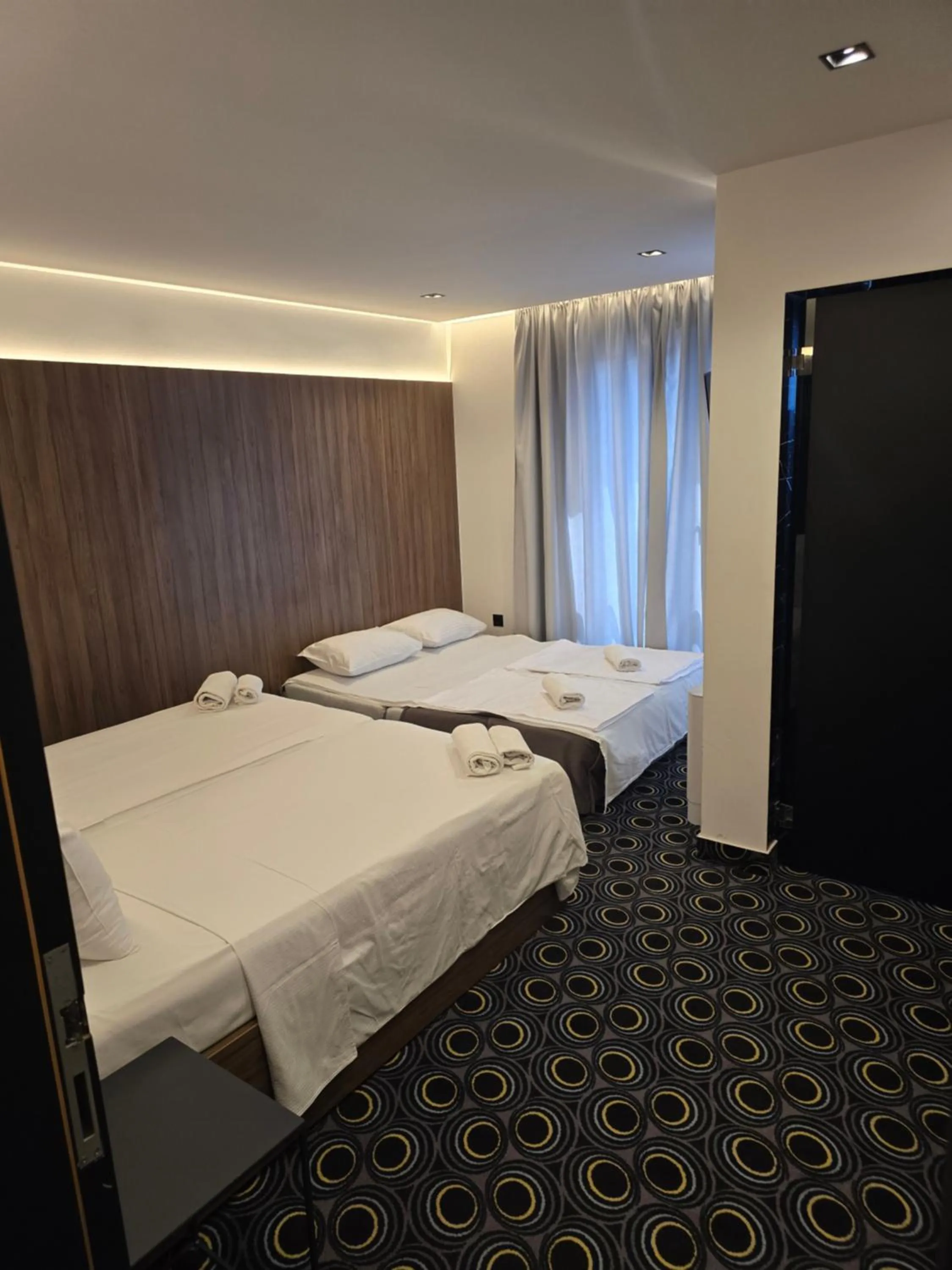 Bed in Hotel Carpe Diem