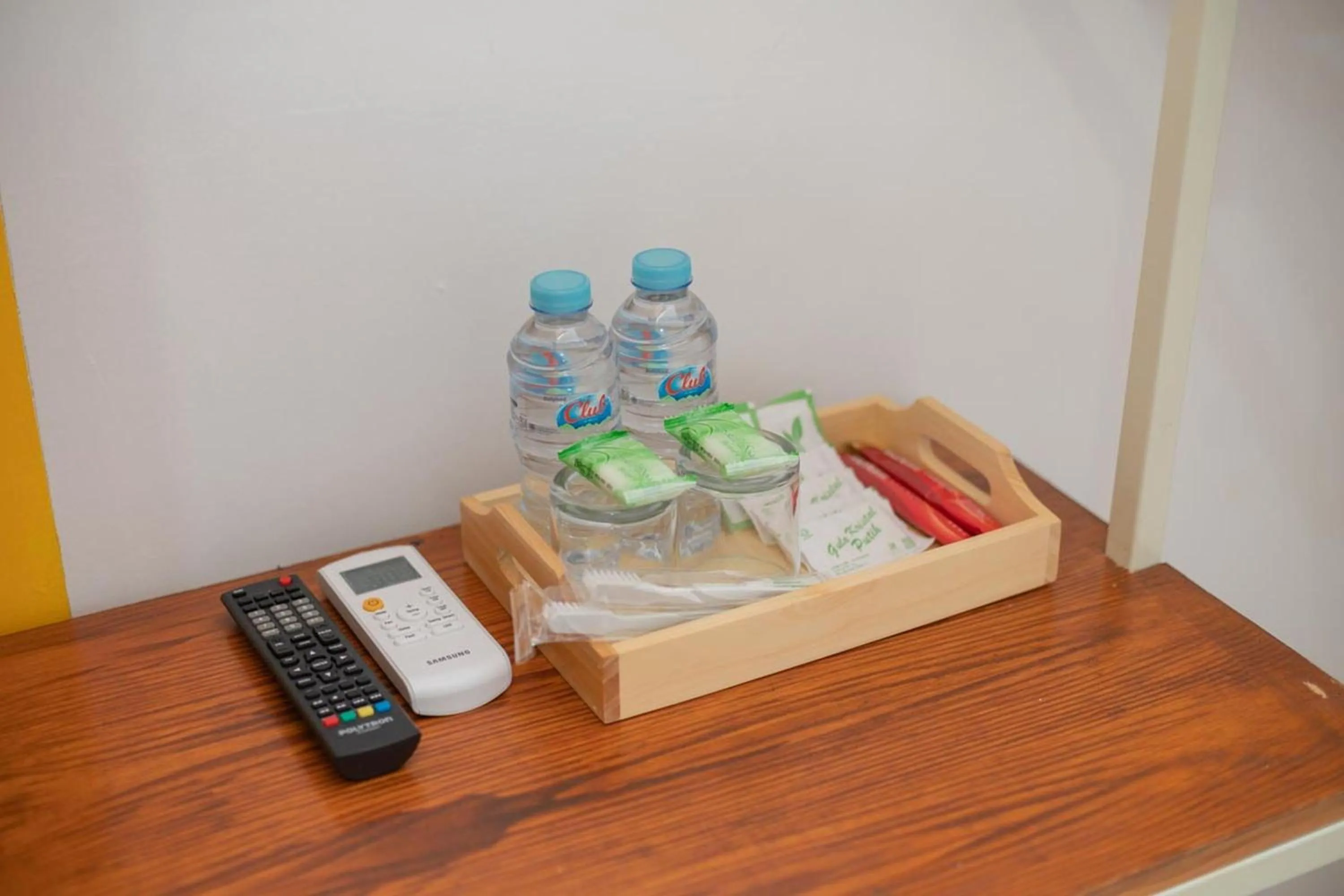 Bedroom in Sans Hotel Queen Batu