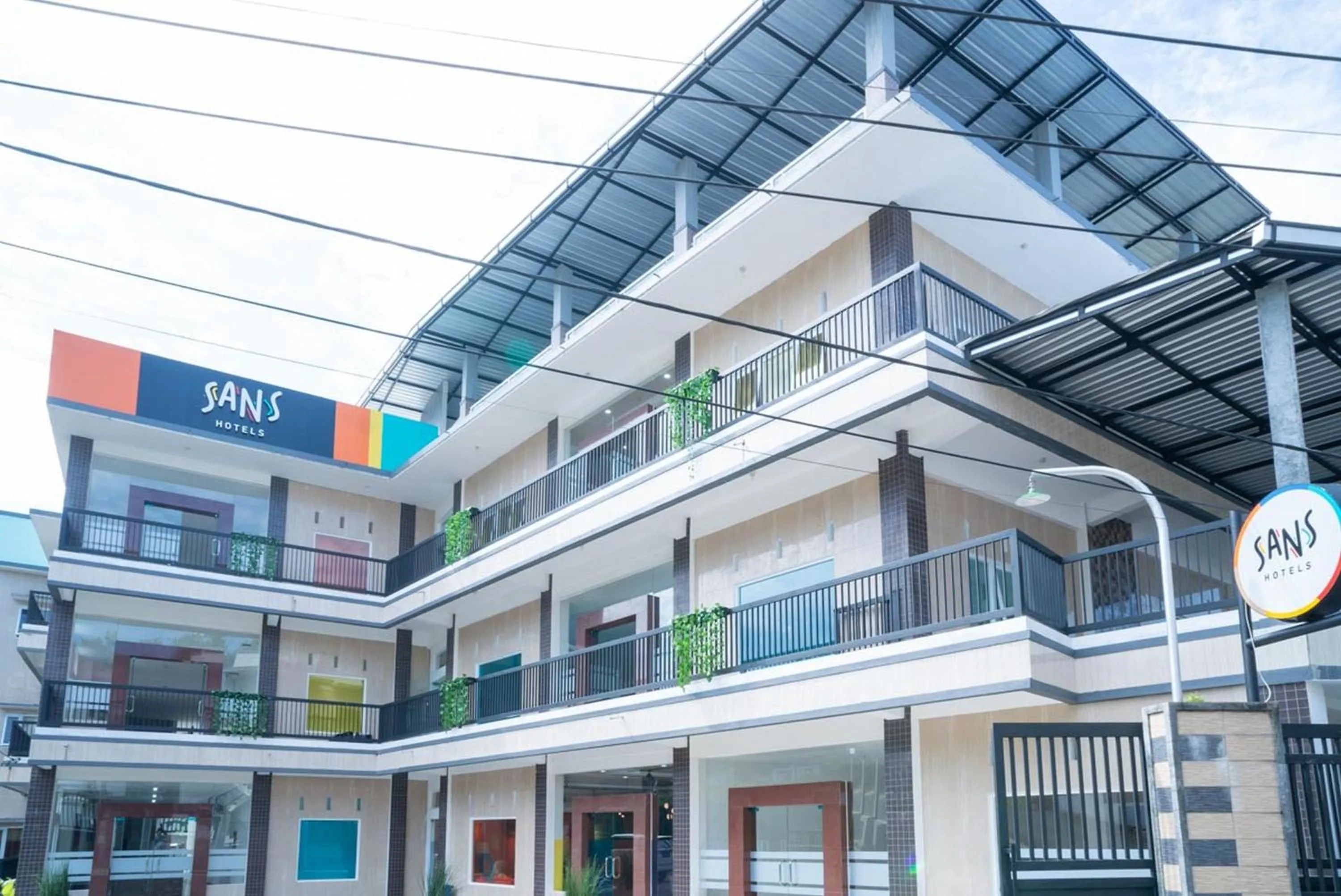 Property building in Sans Hotel Queen Batu