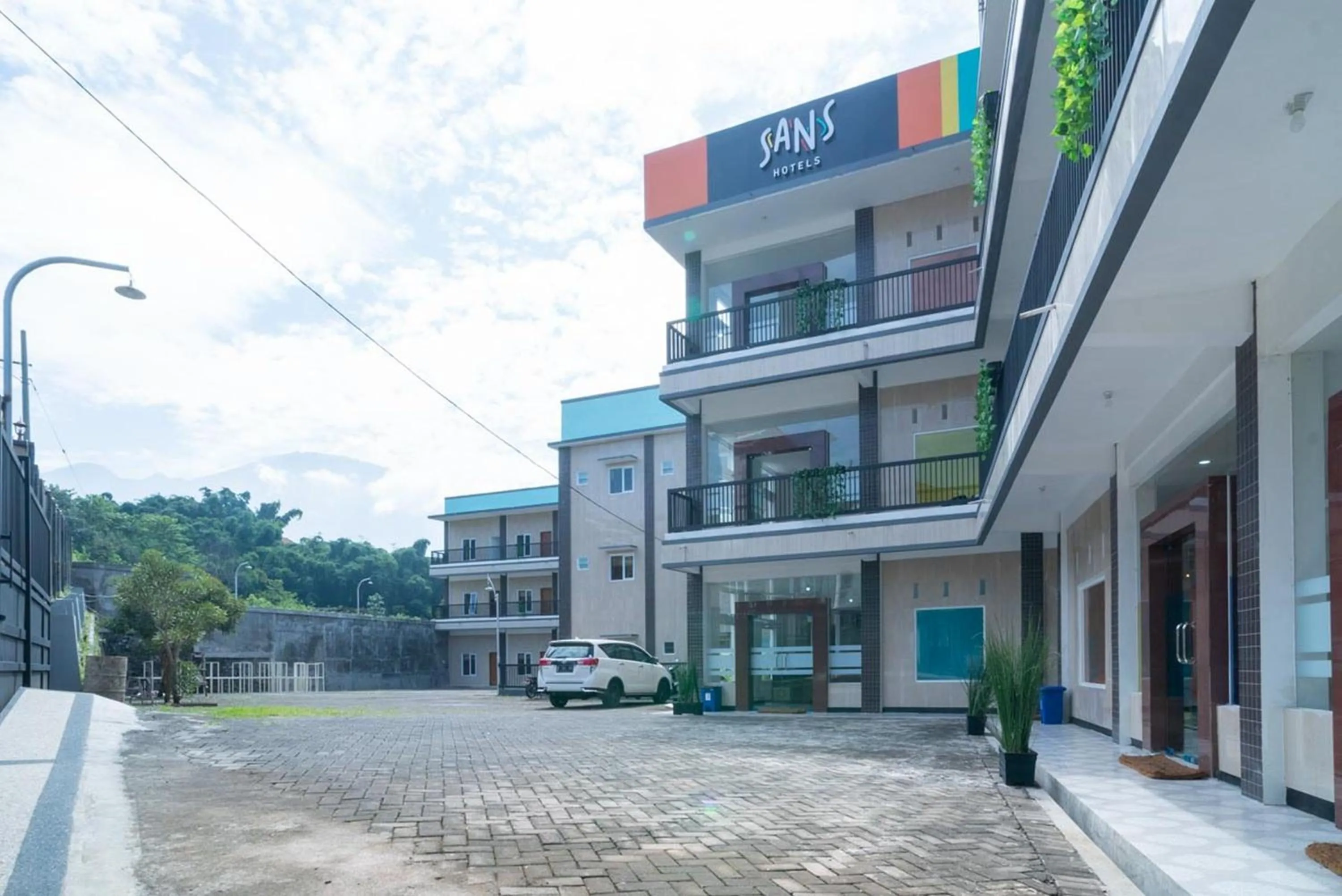 Property building in Sans Hotel Queen Batu
